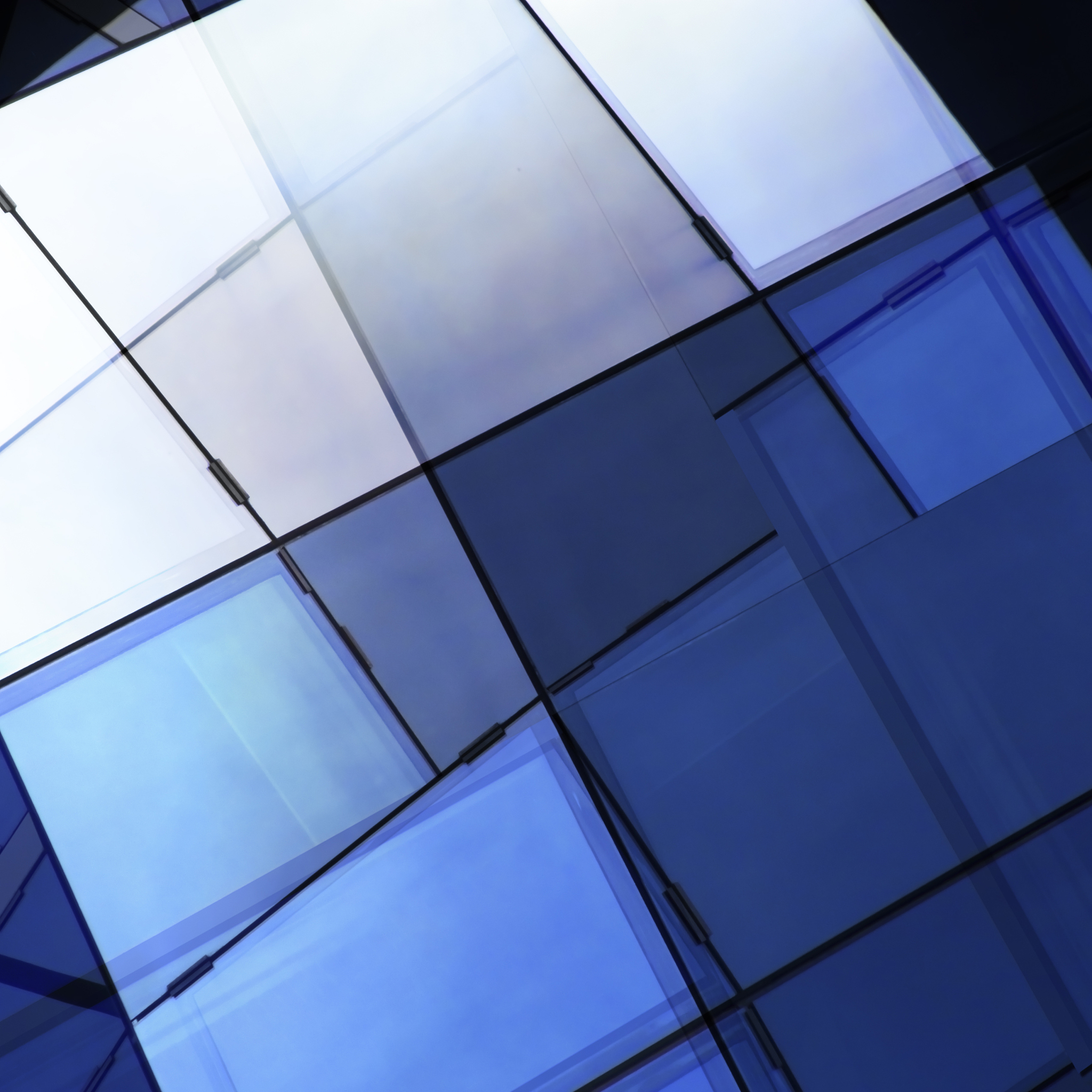 double exposure close-up fragment of glass wall / stained-glass 