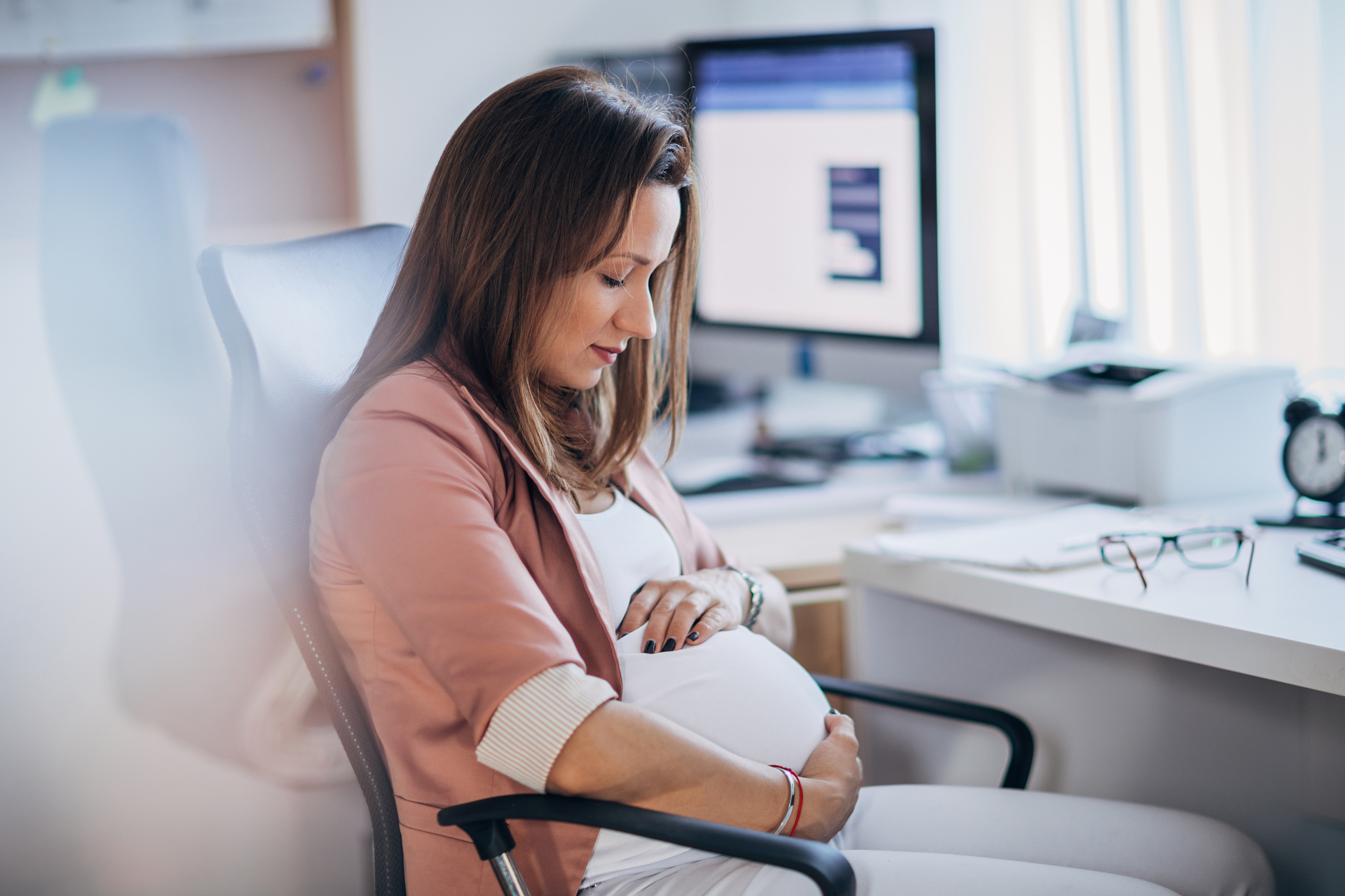 pregnant woman in office