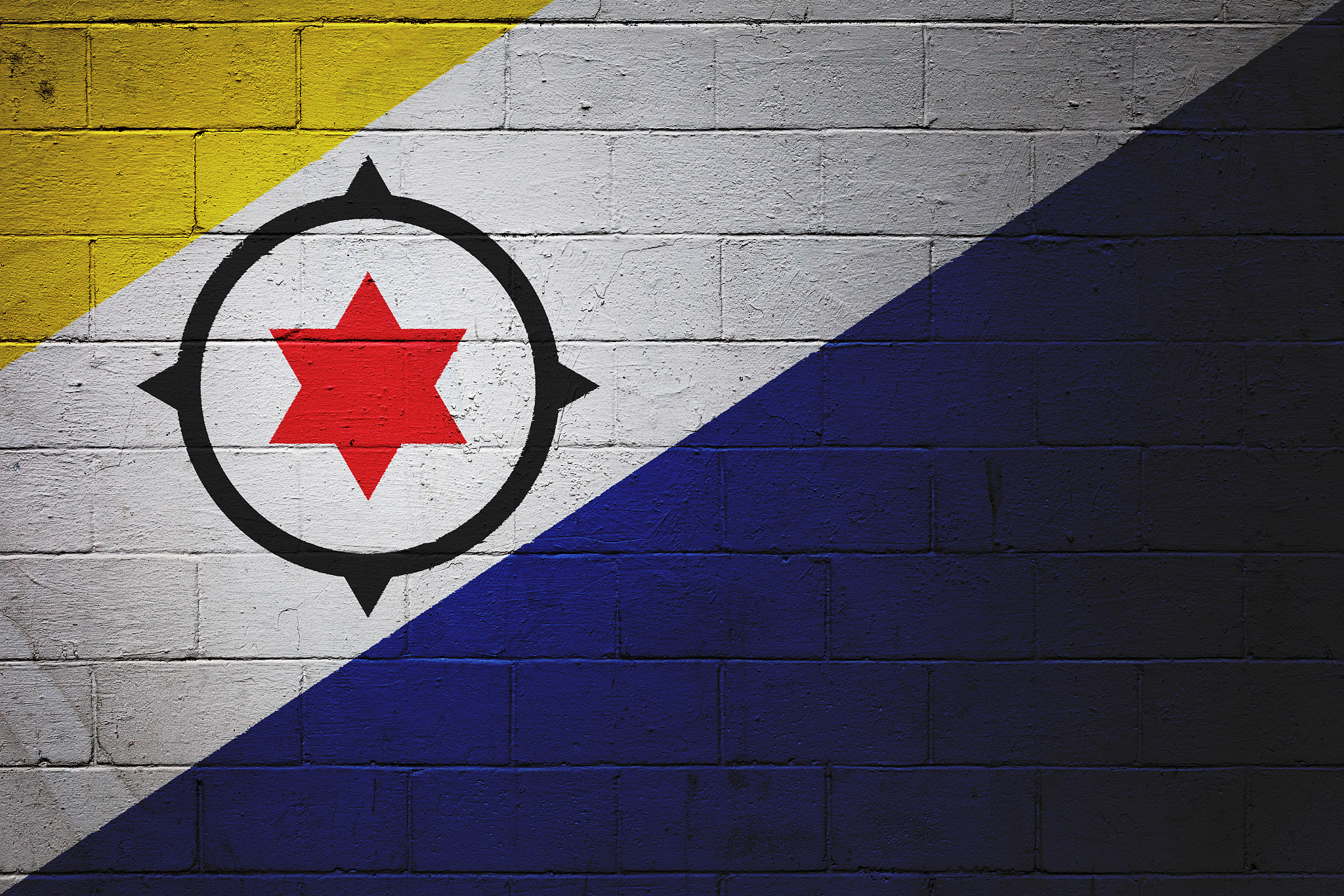 flag of bonaire painted on a wall