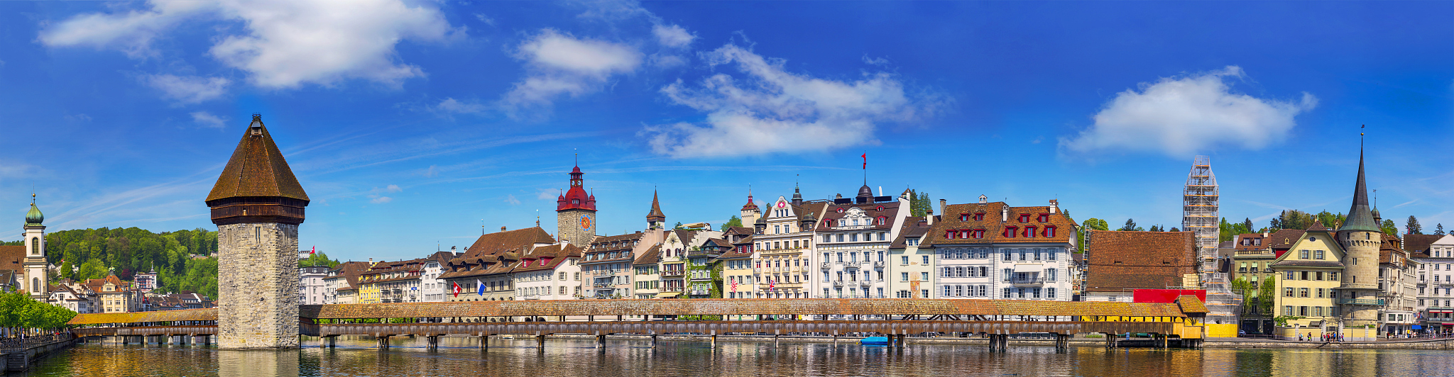 chapel bridge famous place on lake luzern with blue sky in luzer