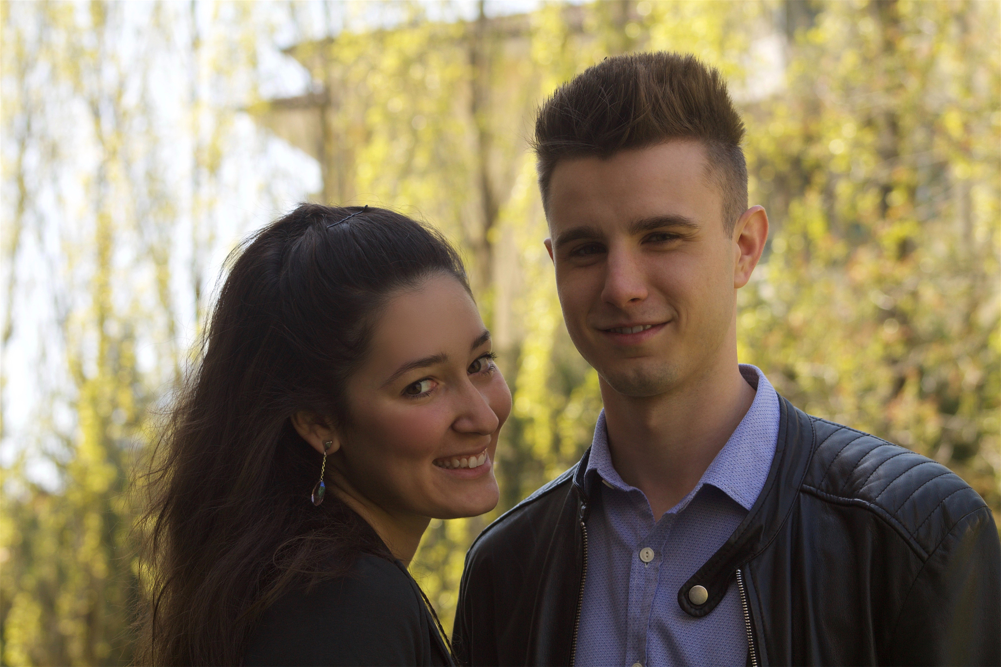 happy young boy and girl in the park