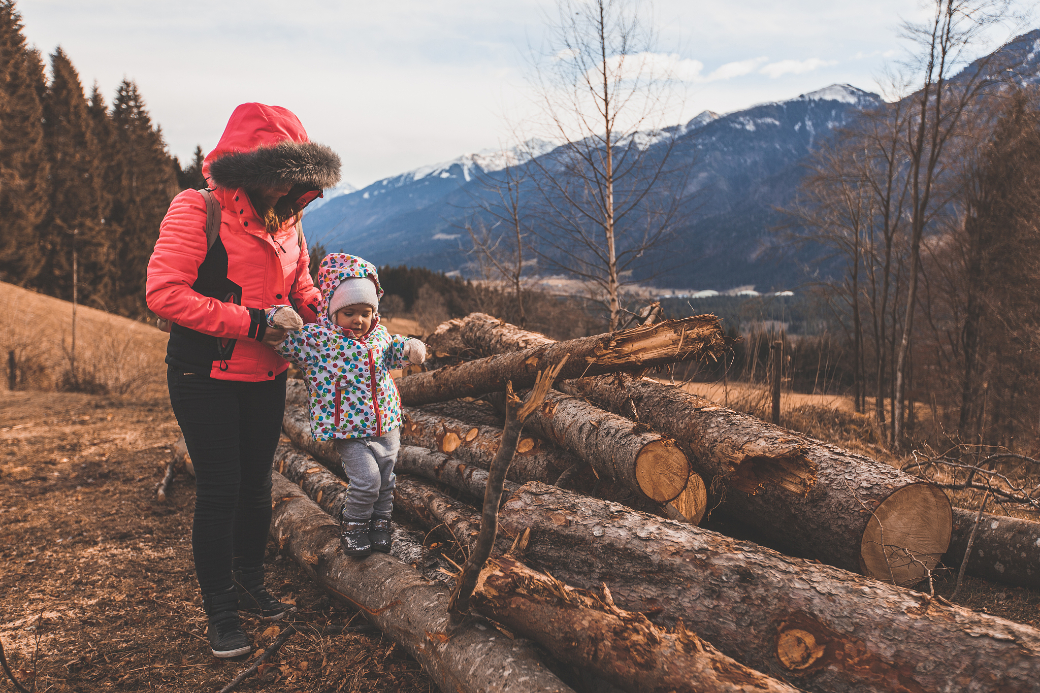 woman and her toddler daughter on a camping adventure