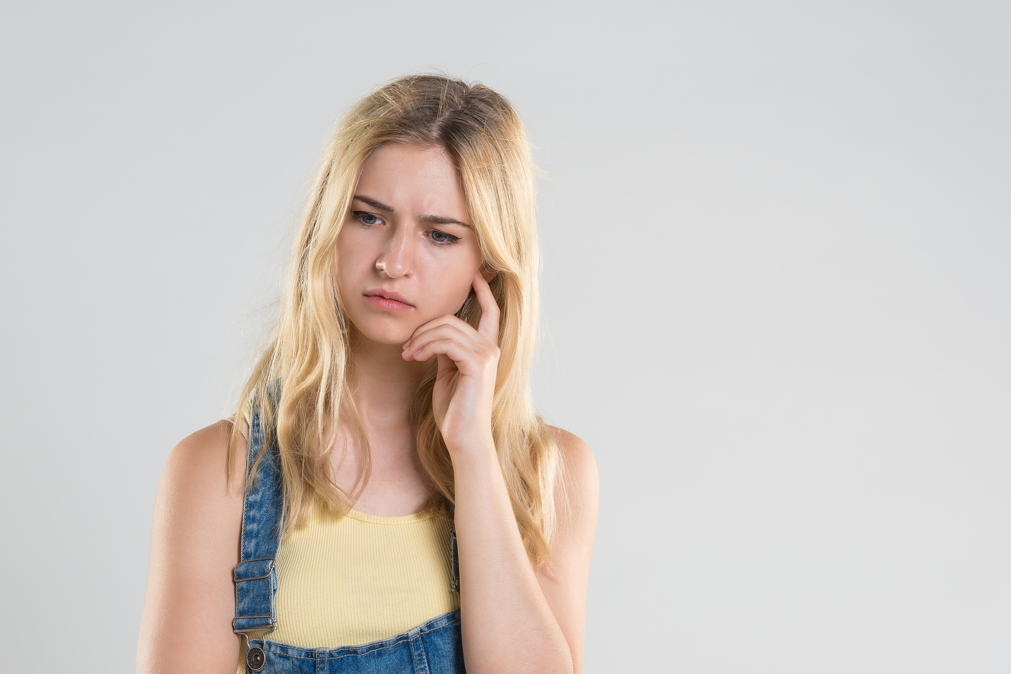 young girl thinking