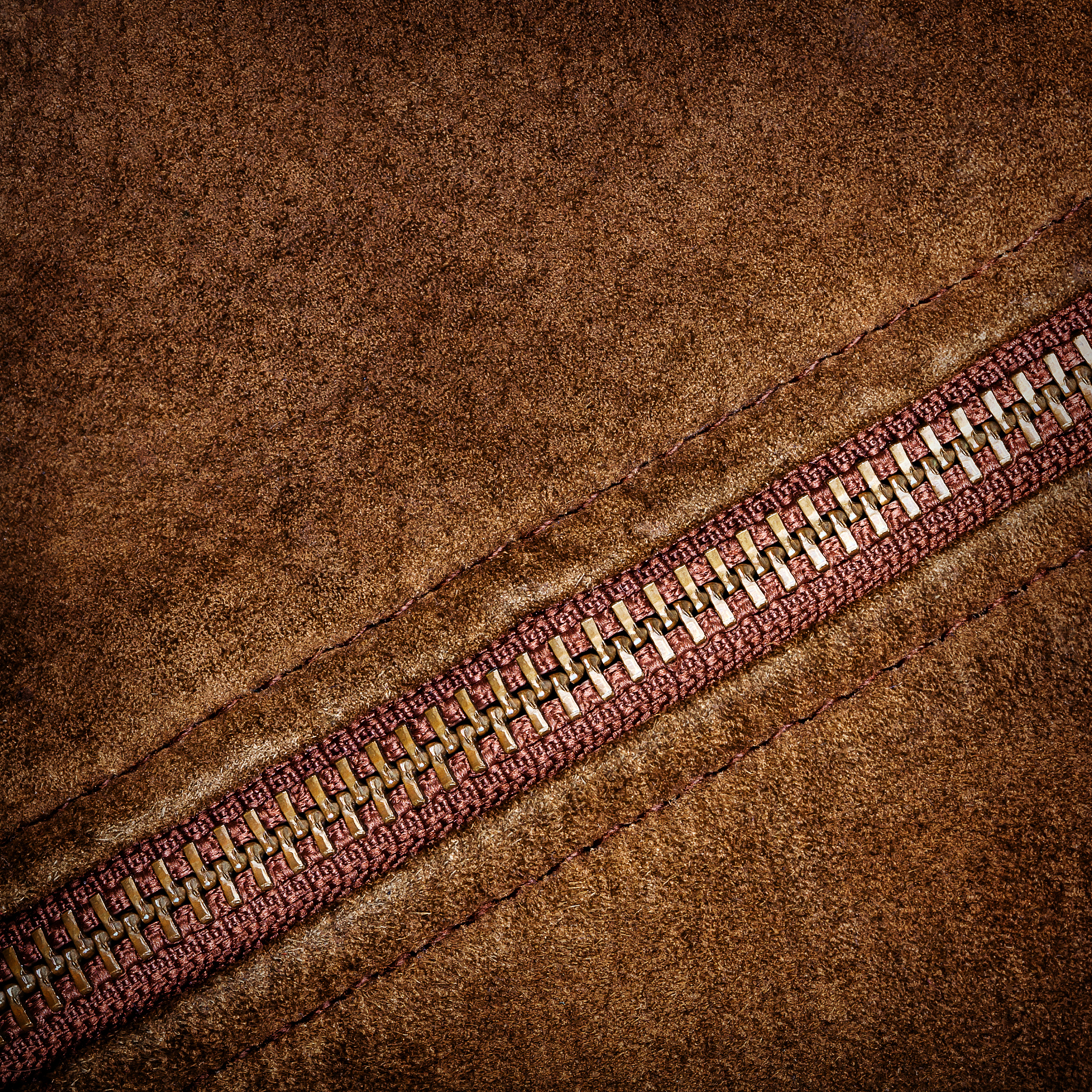 zipper and suede