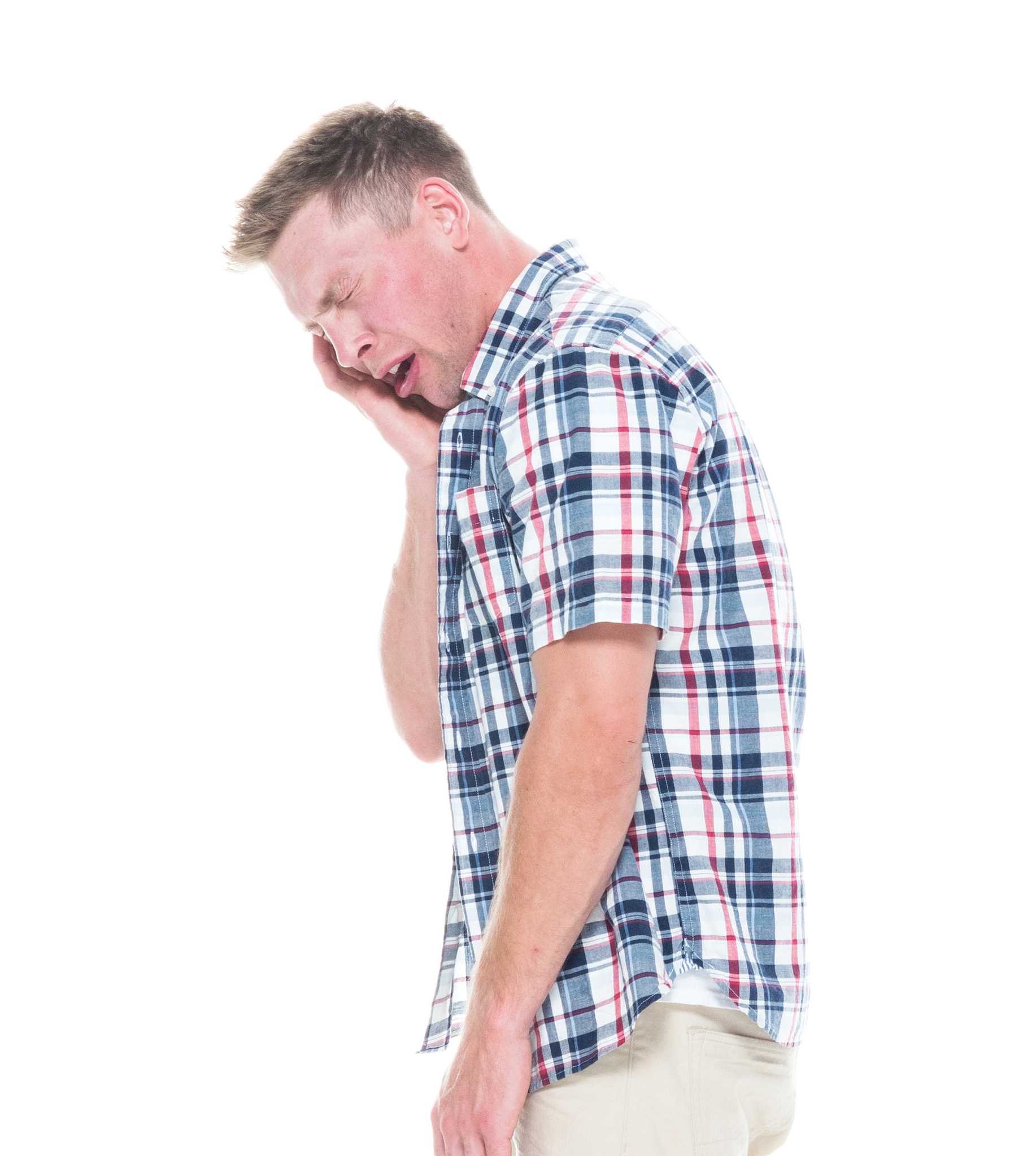 handsome man in shirt and shorts is tried, side view
