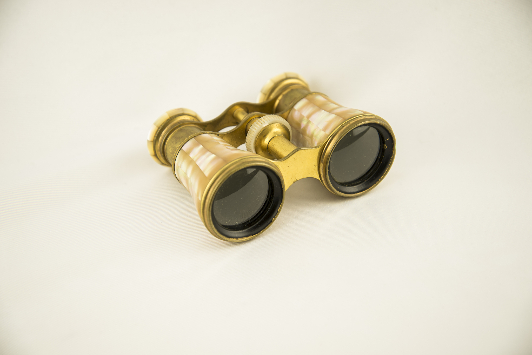 old opera binoculars isolated on a white background