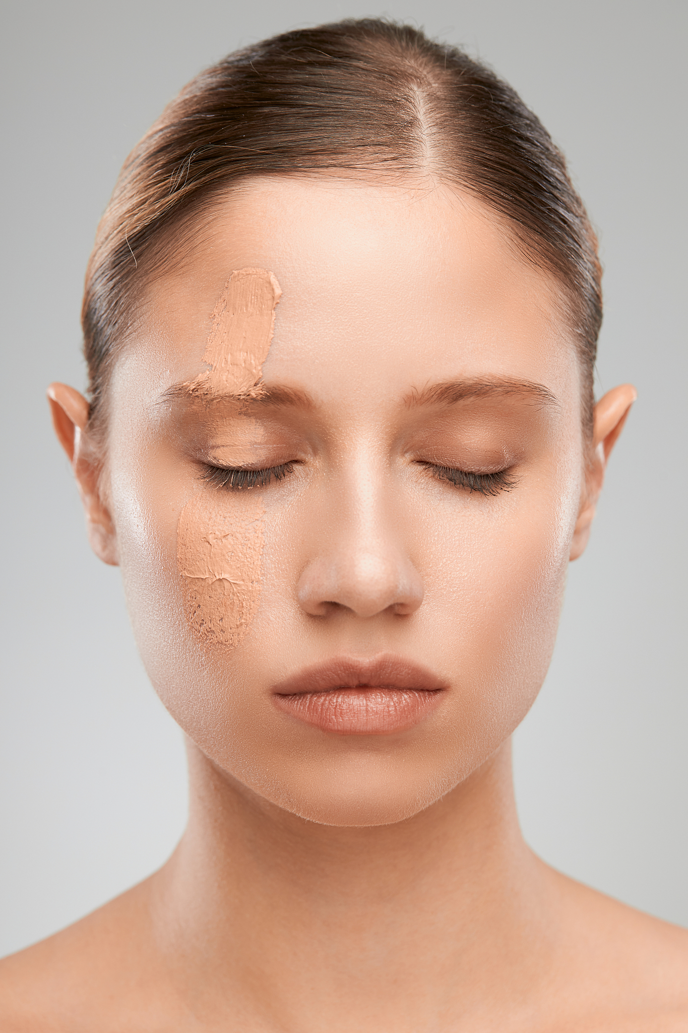beautiful woman posing with powder on face.