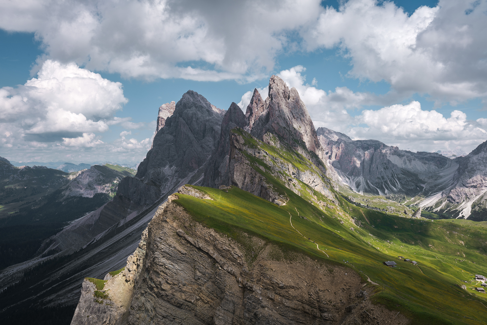 landscapes in seceda with mountain clouds and blue sky in dolomi