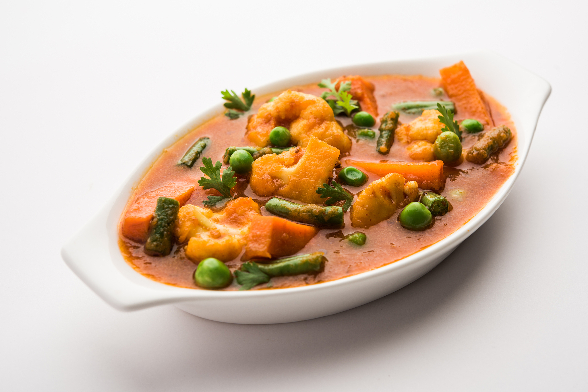 indian mix veg or mixed vegetable recipe served in a bowl with c
