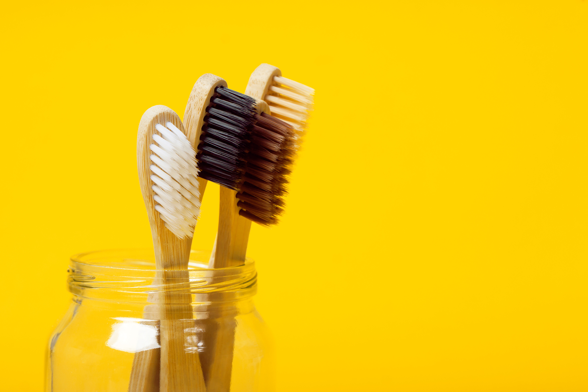 set of four eco friendly bamboo toothbrushes