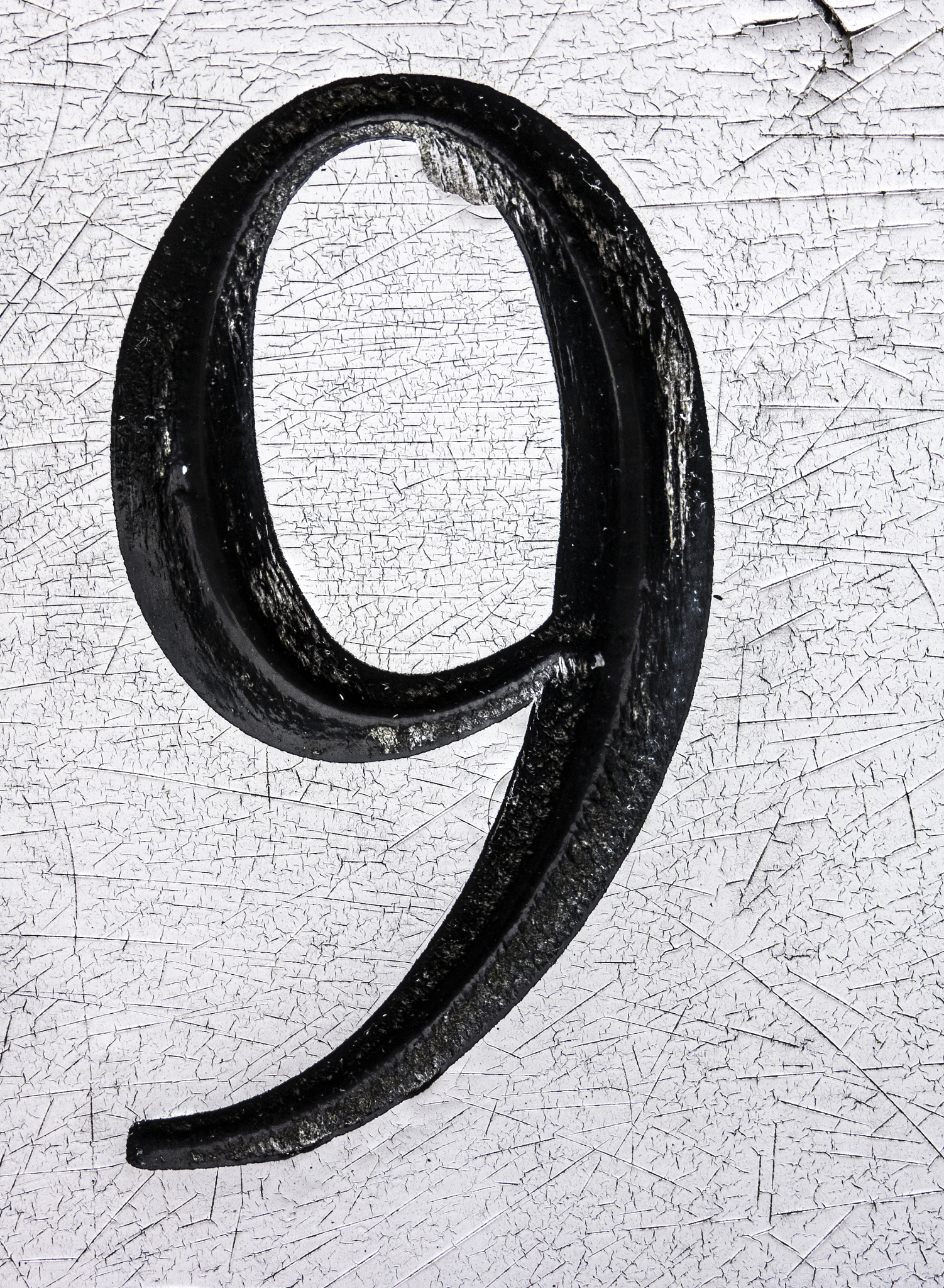written wording in distressed state typography found number 9