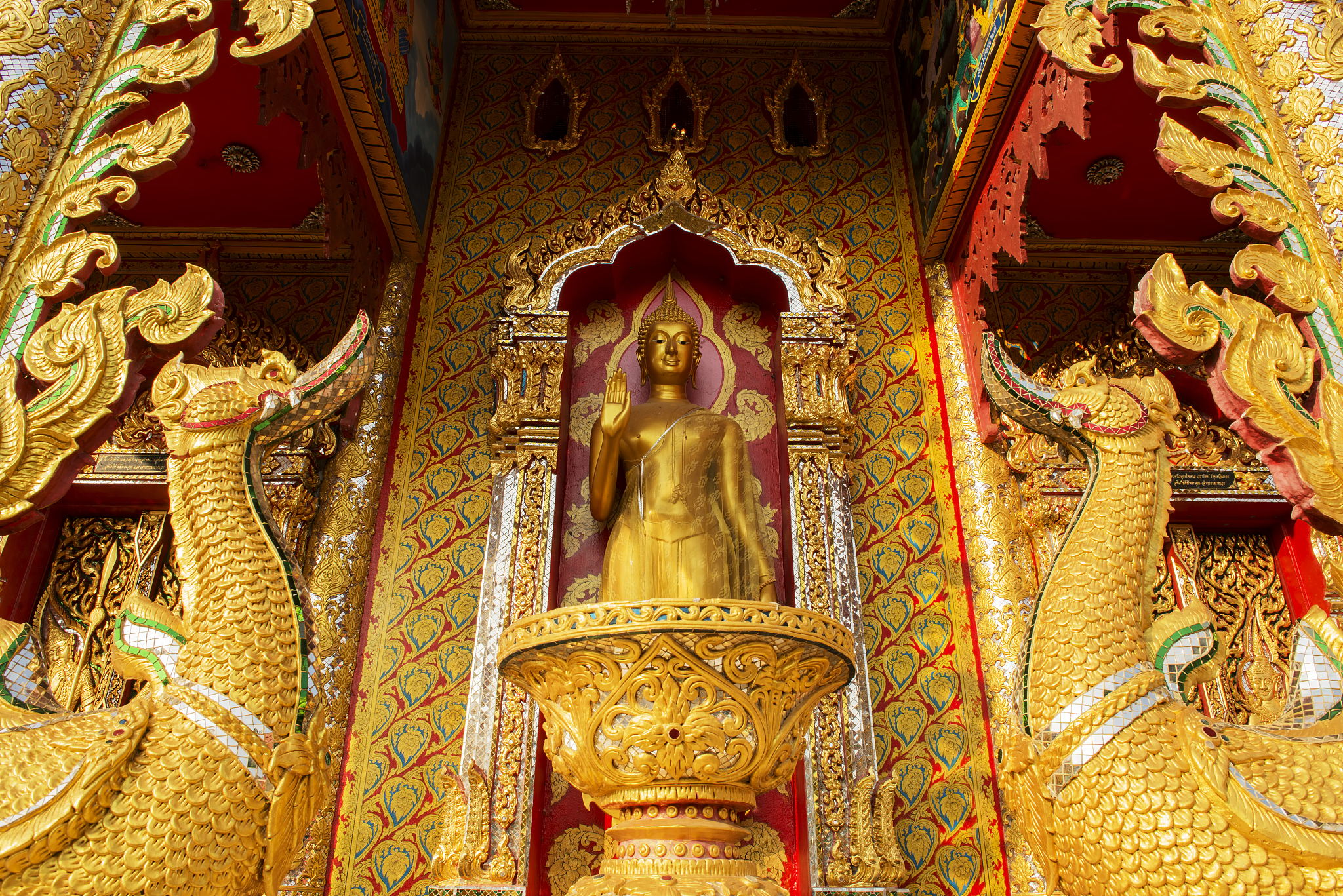 golden buddha statue in temple ,thailand