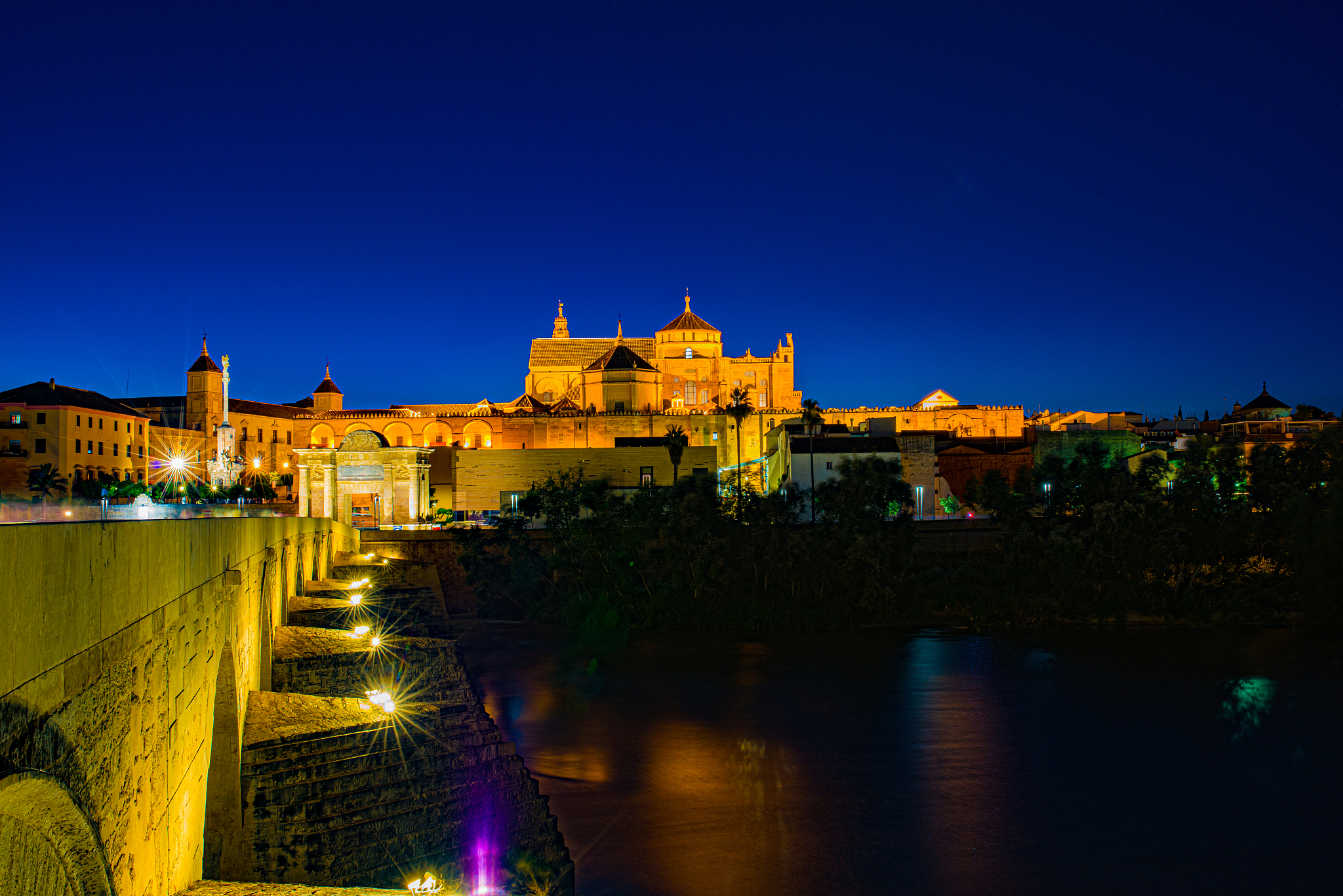 mosque-cathedral and roman bridge of cordoba, andalusia, spain