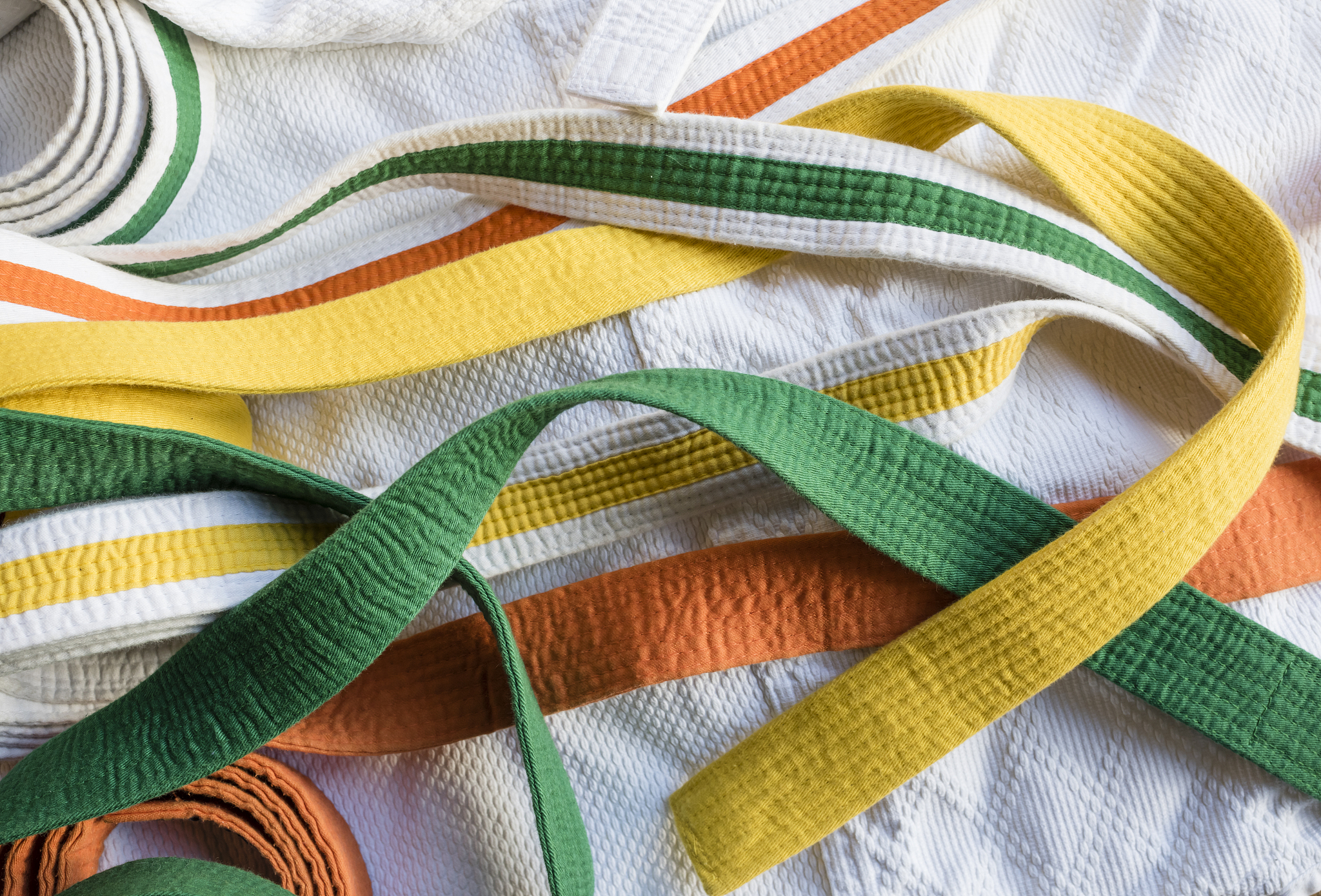variety of karate belts in different colors