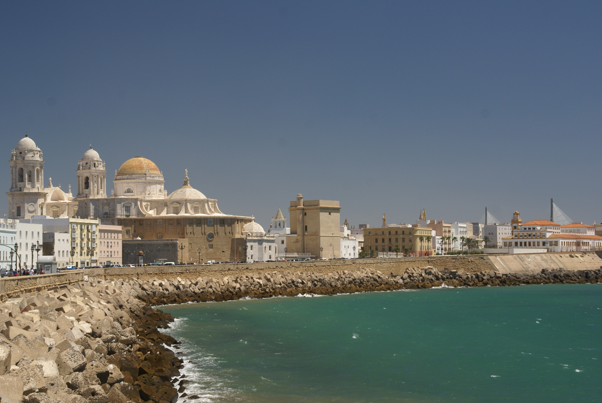 cadiz cathedral by sea against clear sky