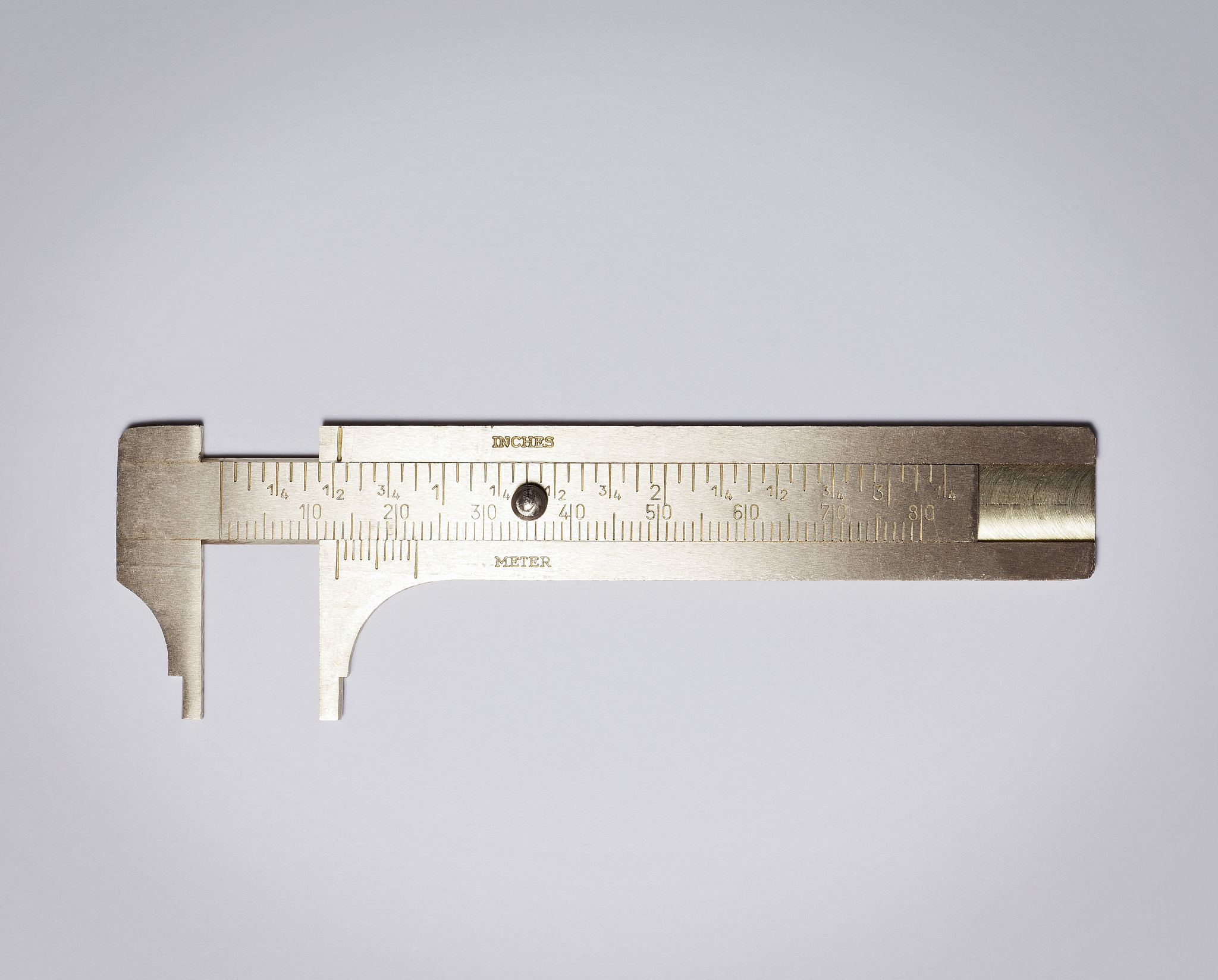 imperial and metric brass sliding gauge.