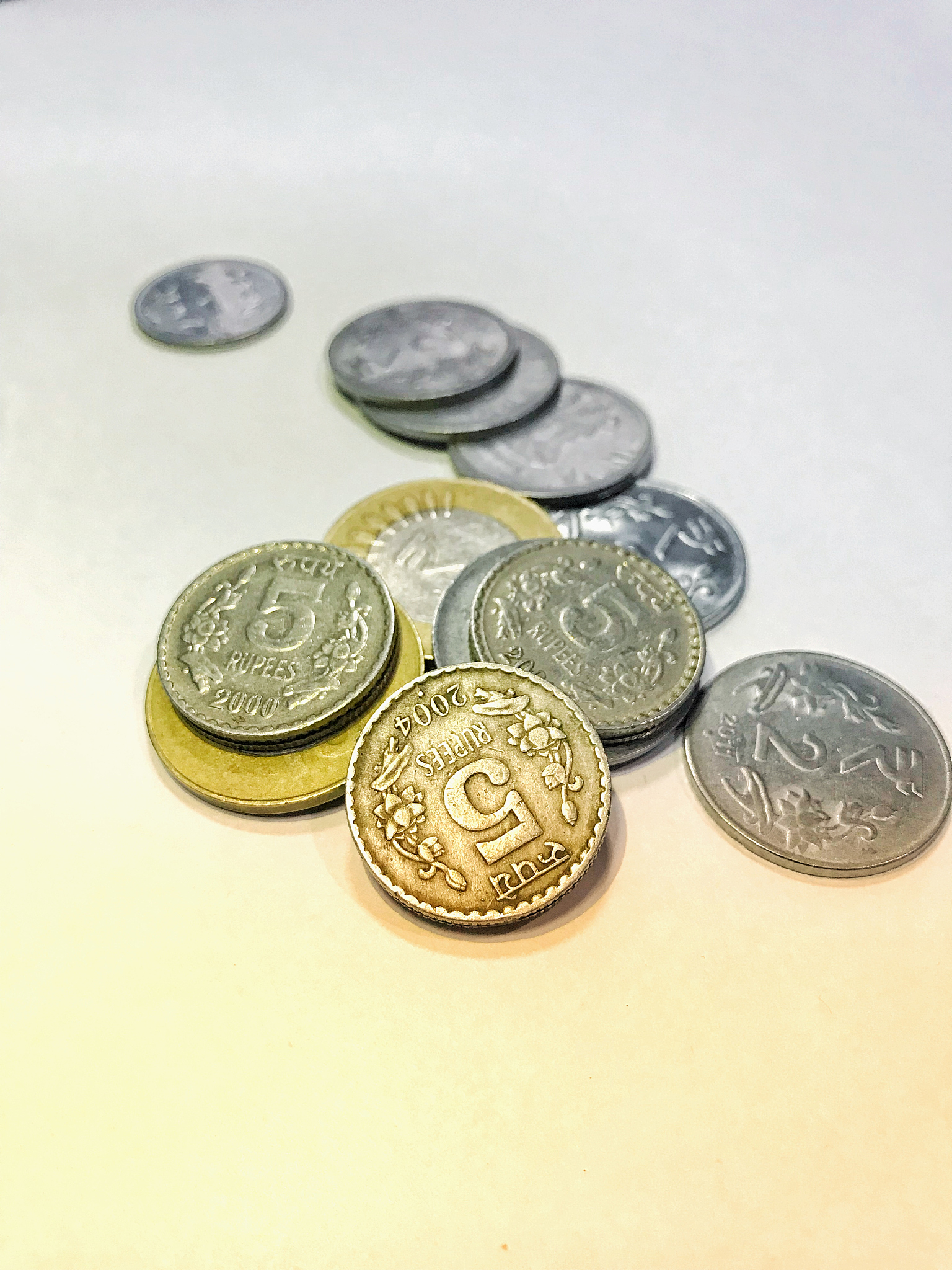十元以内的零钱 - 定义、范围及全球比较