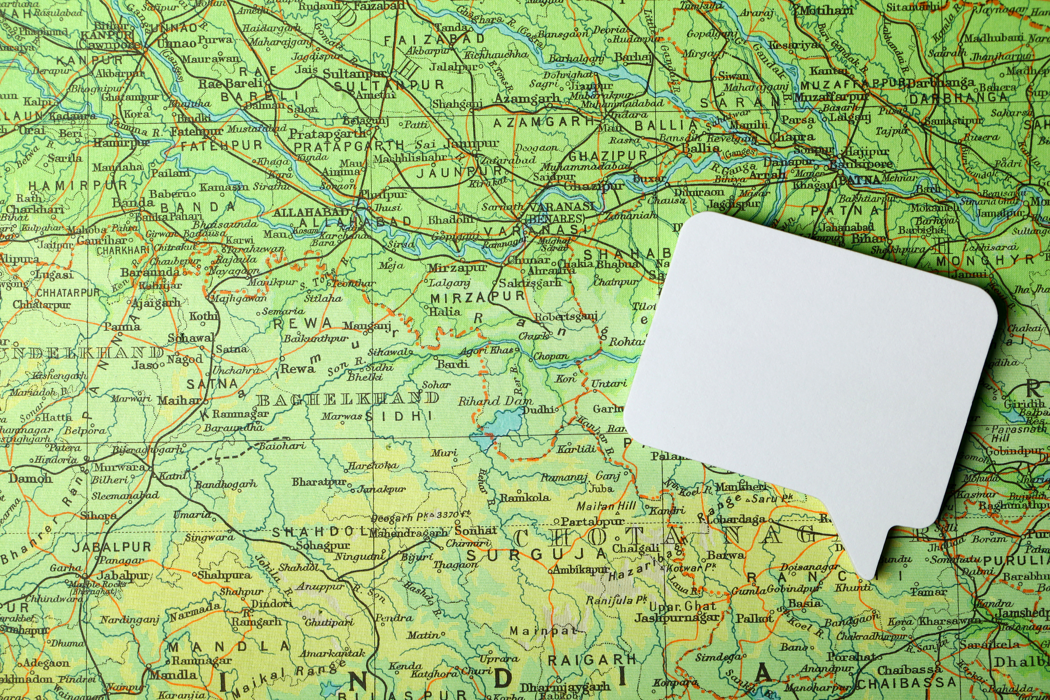 speech bubble on a foreign map.