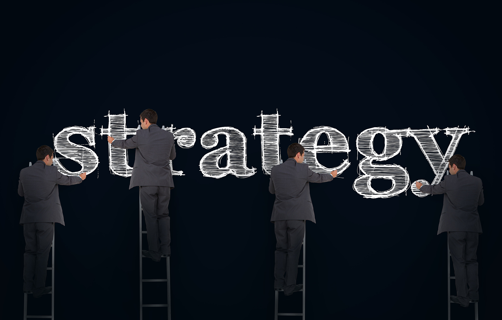 multiple image of a businessman writing strategy on a giant blac
