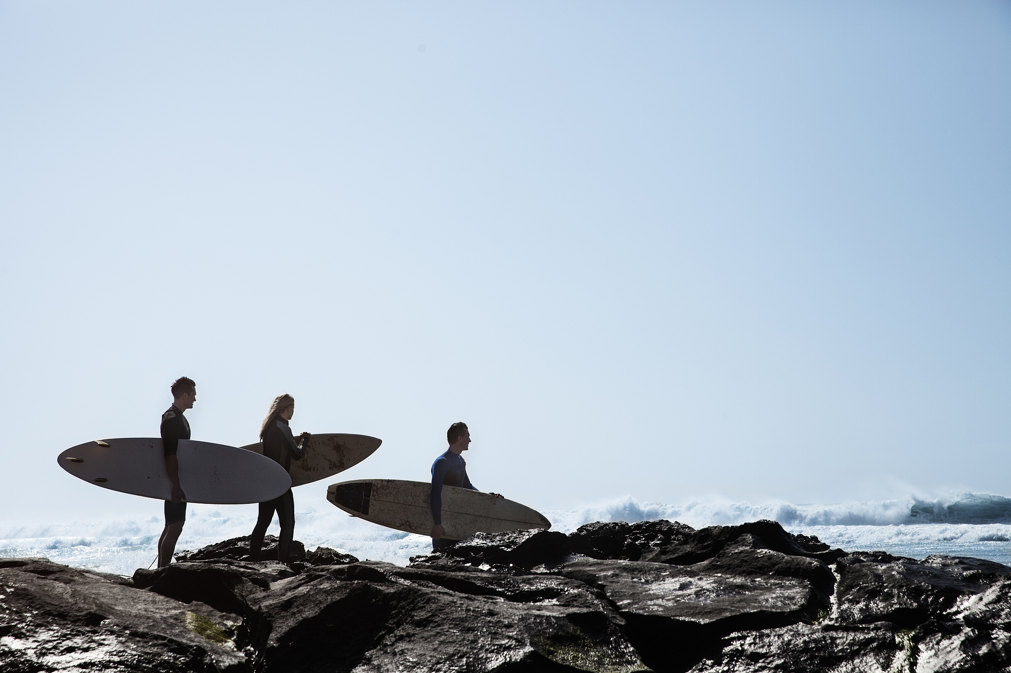 surfers on the beach