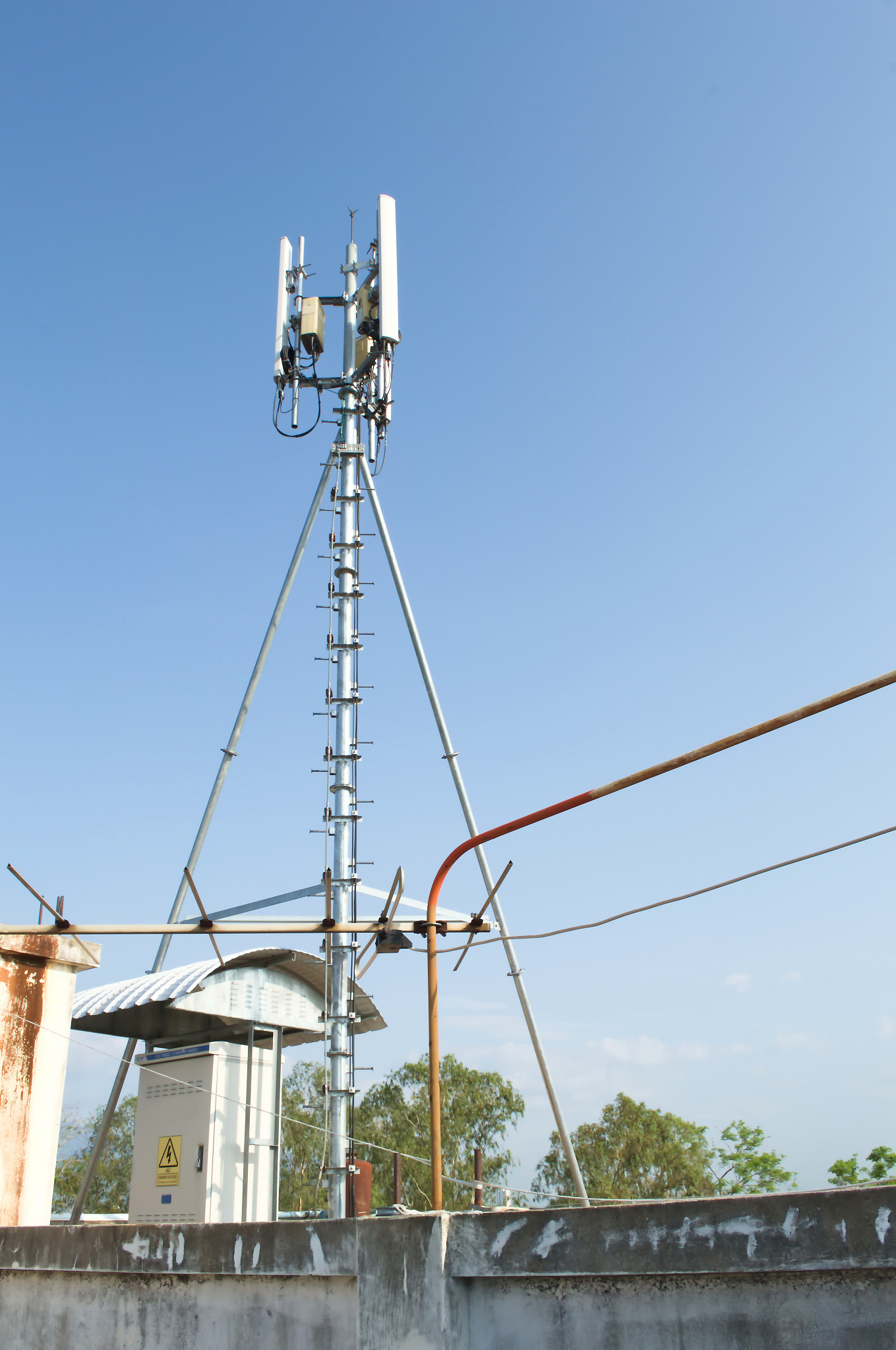 high mast metal structure telecommunication on tower with blue s