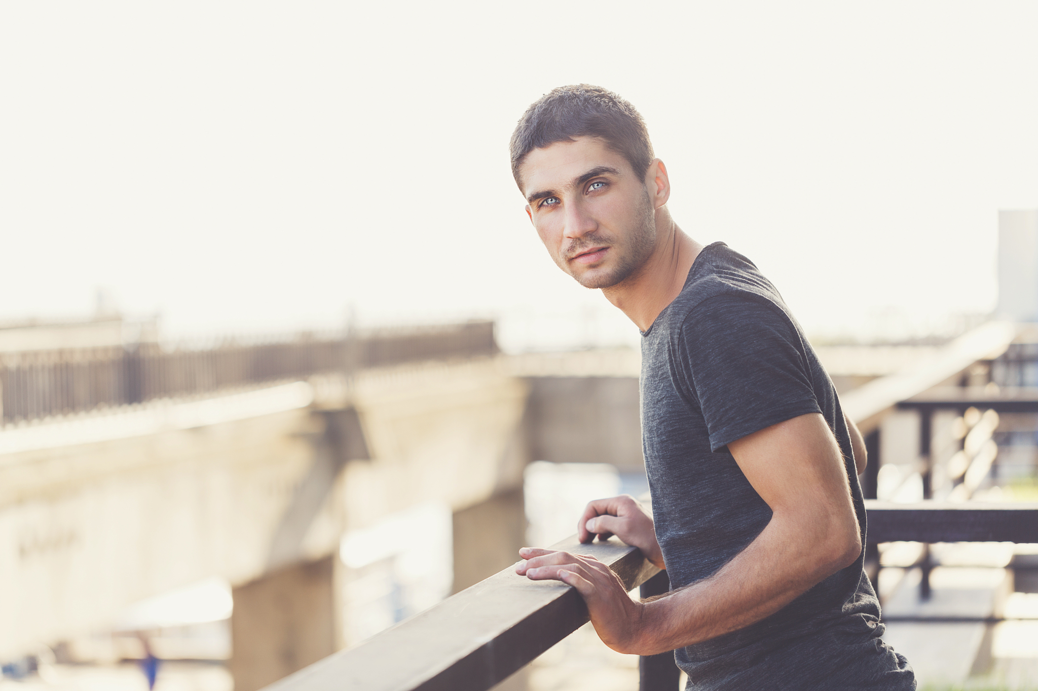 man in black t-shirt.