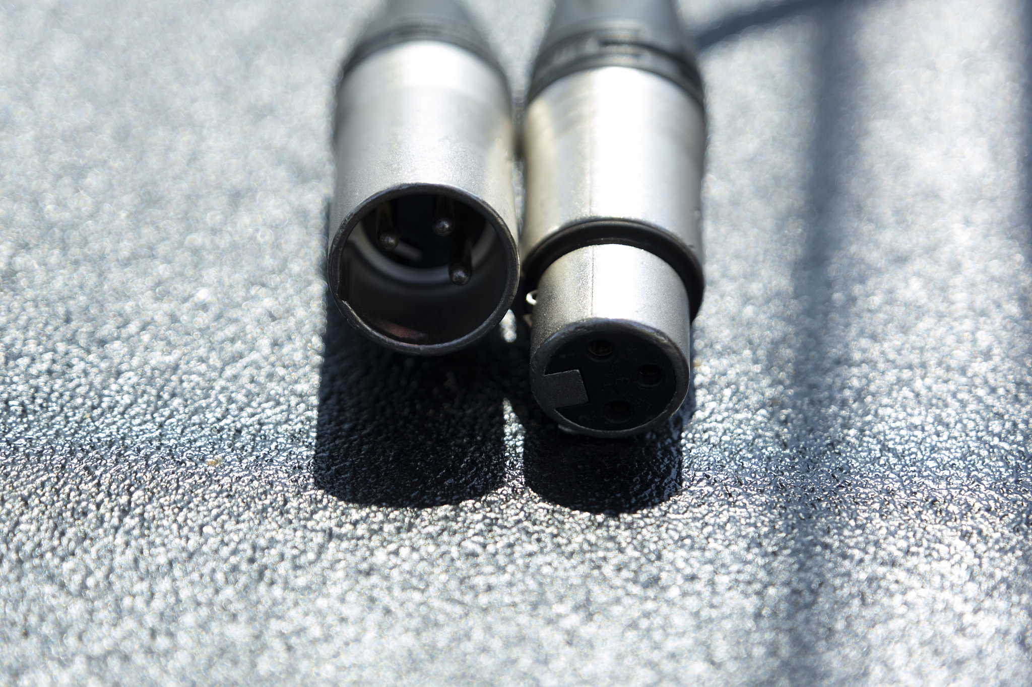the audio cable is on the stage podium in preparation for a conc