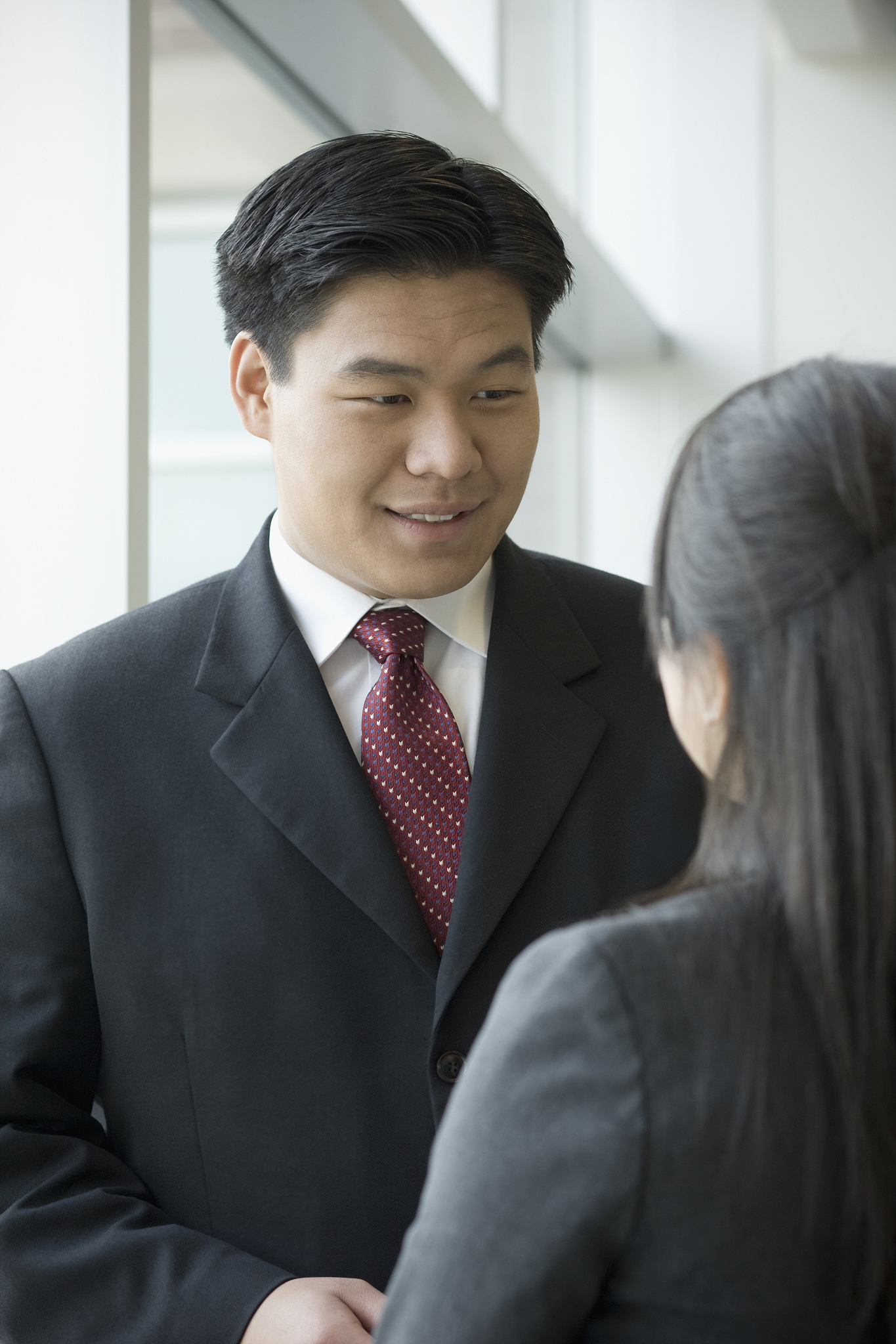 asian business people talking