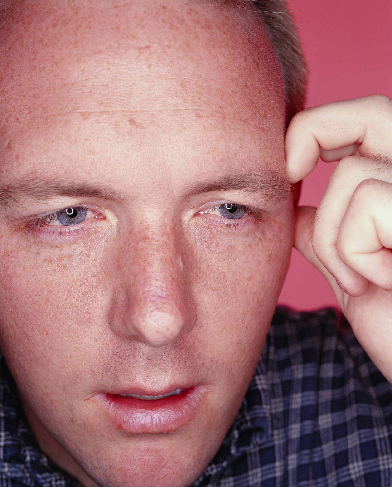 man, 31, thinking close-up