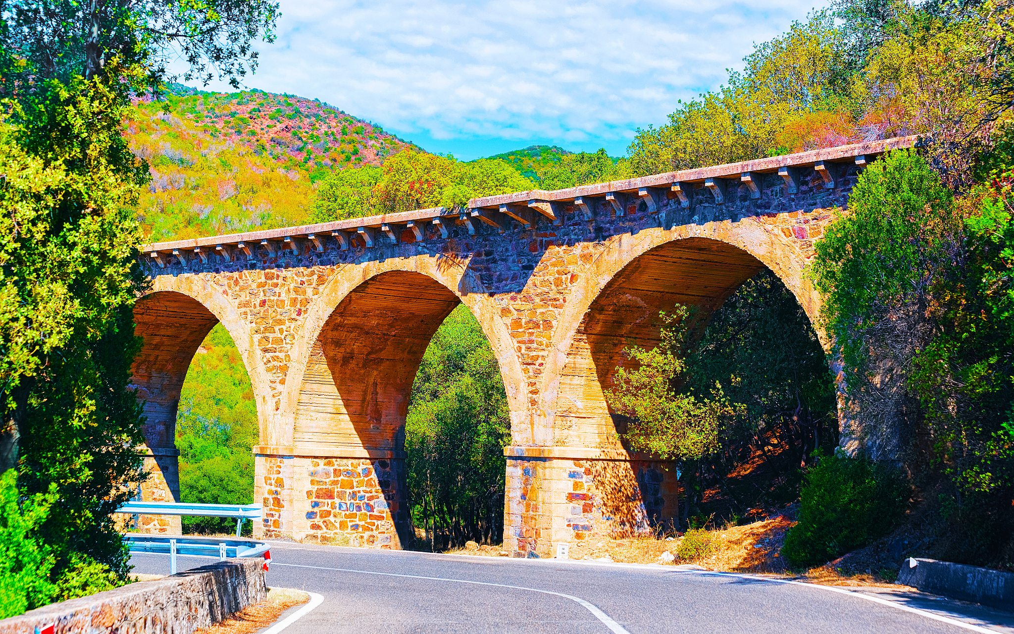 road and aqueduct in carbonia iglesias province sardinia reflex