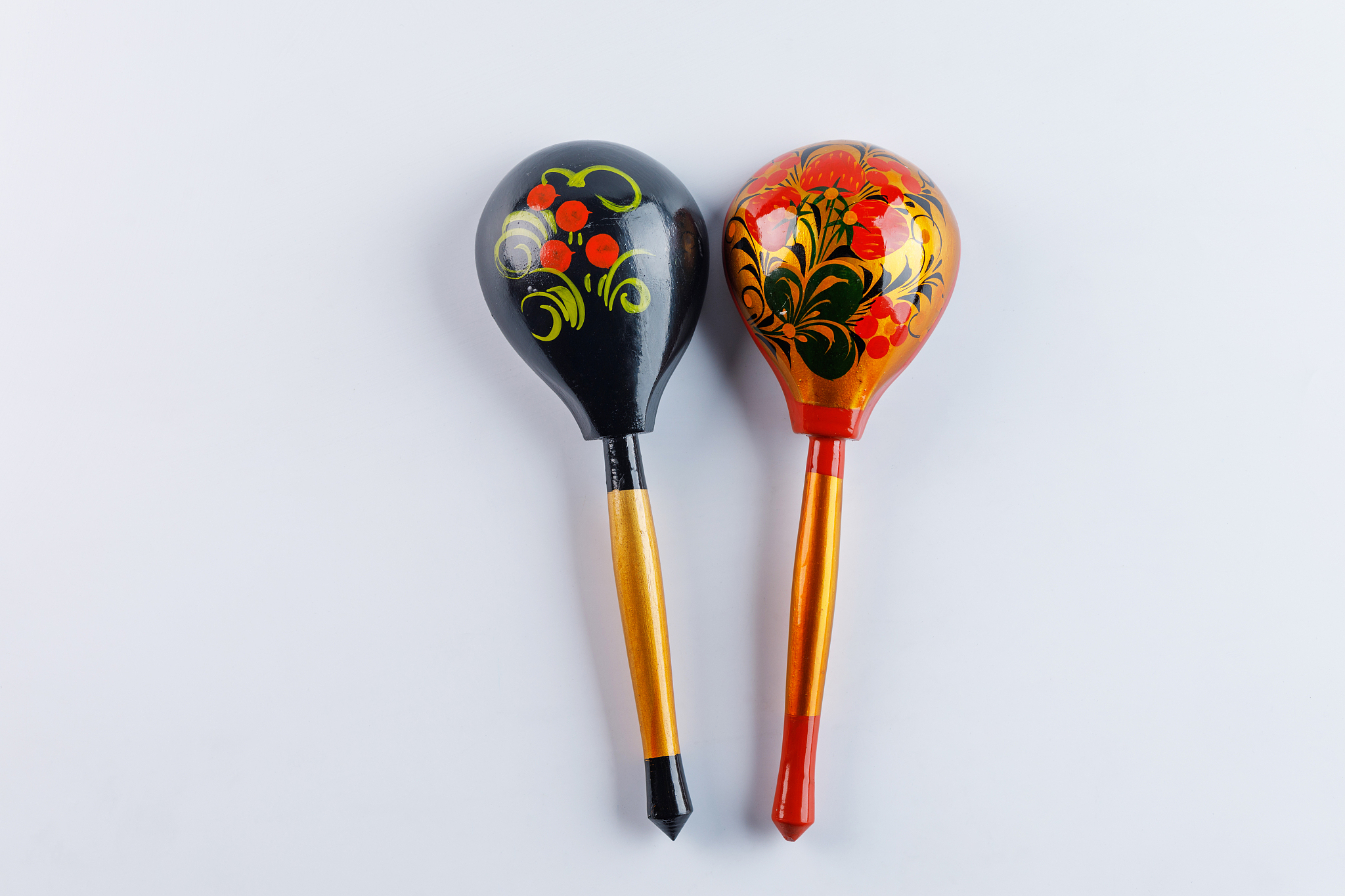 two spoons with a traditional pattern. wooden spoons with floral