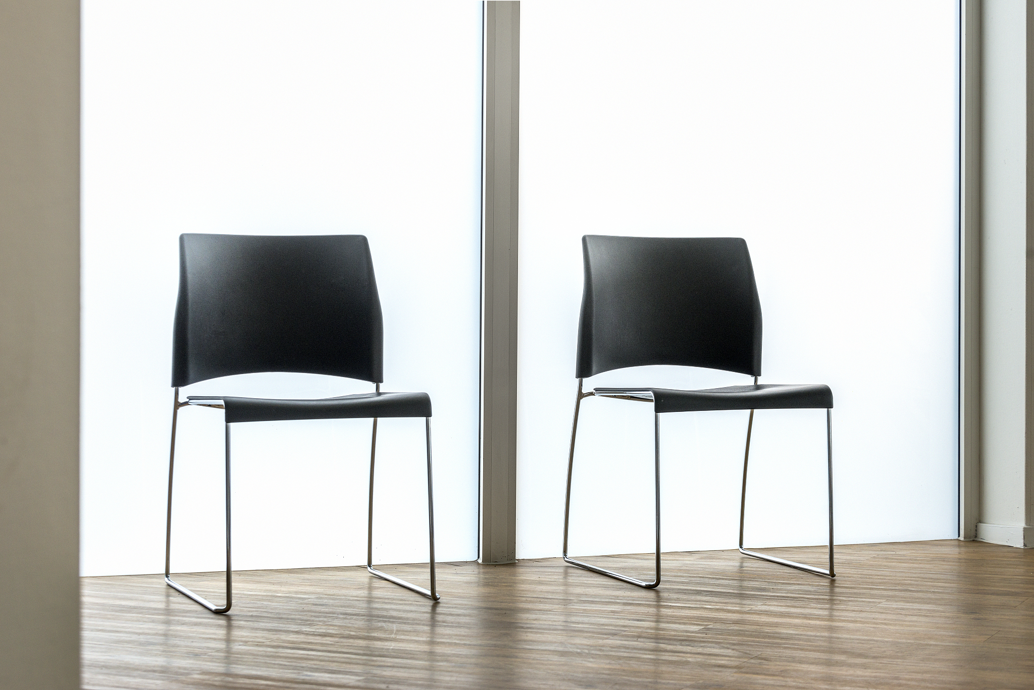 empty waiting room in office with two chairs
