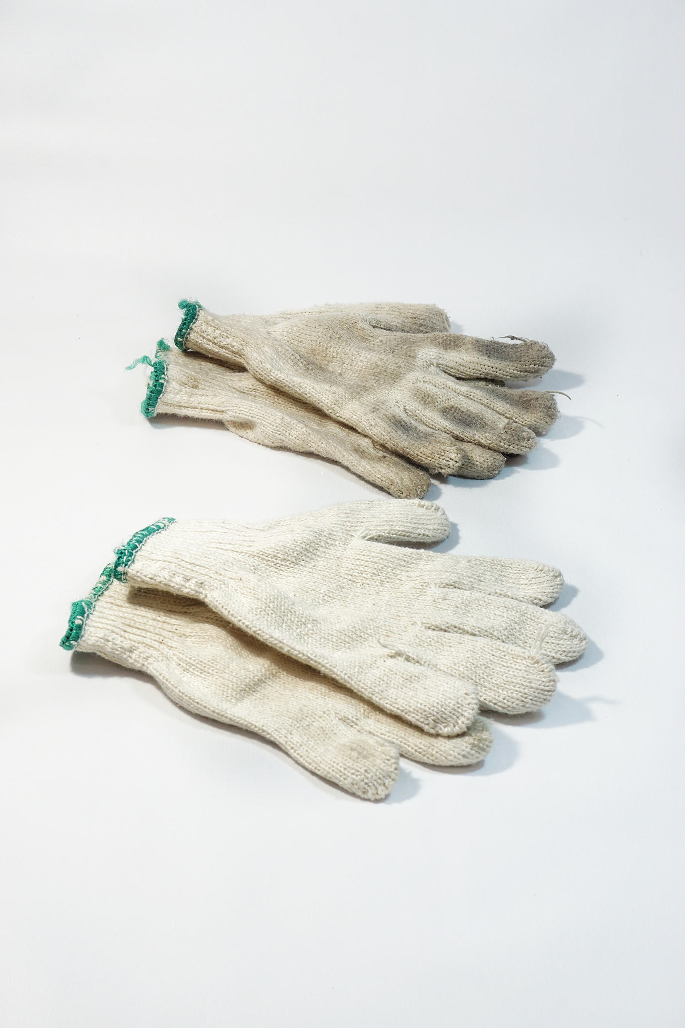 close-up of woolen gloves on white background