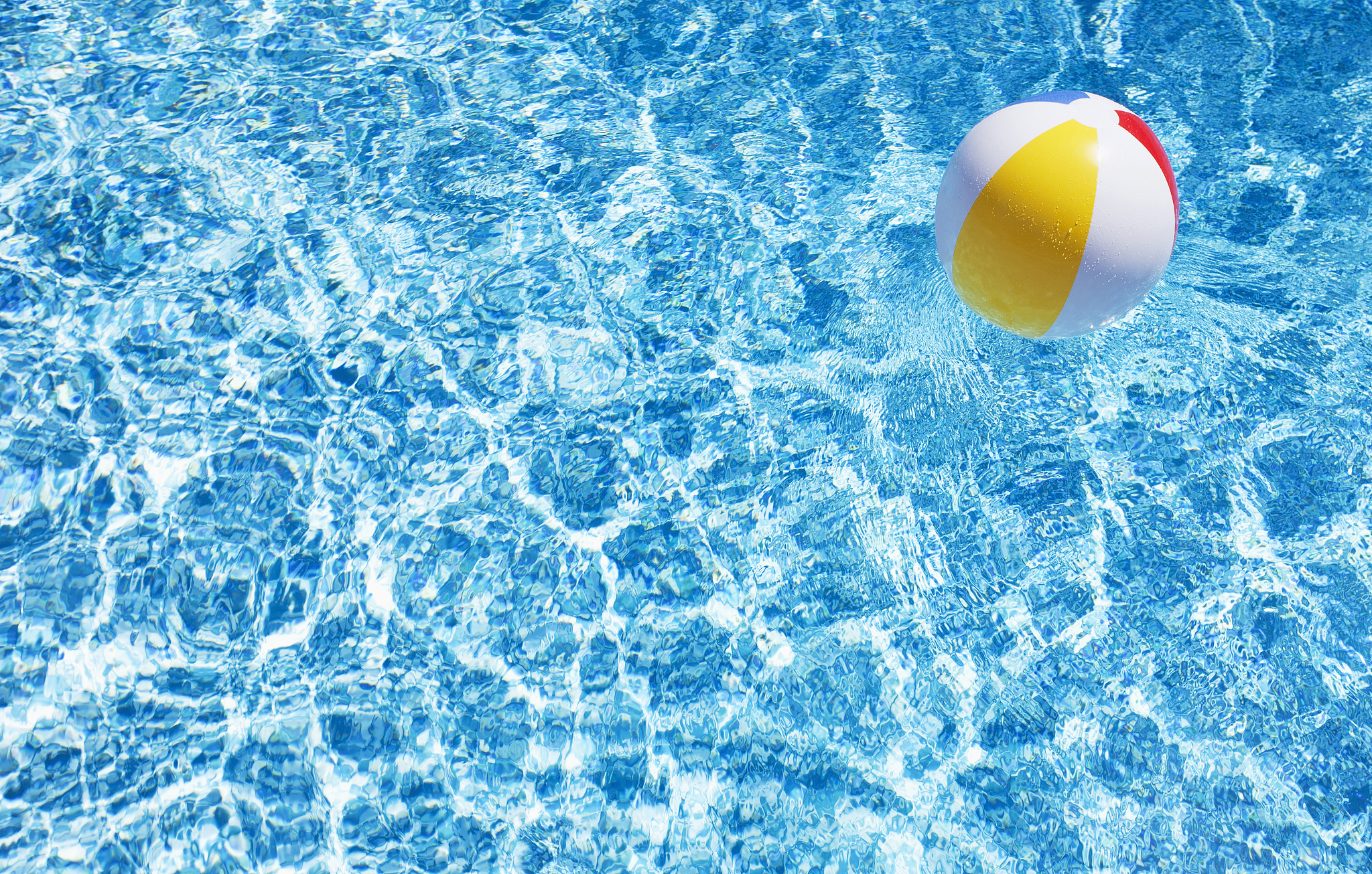 usa, massachusetts, nantucket, beach ball in swimming pool