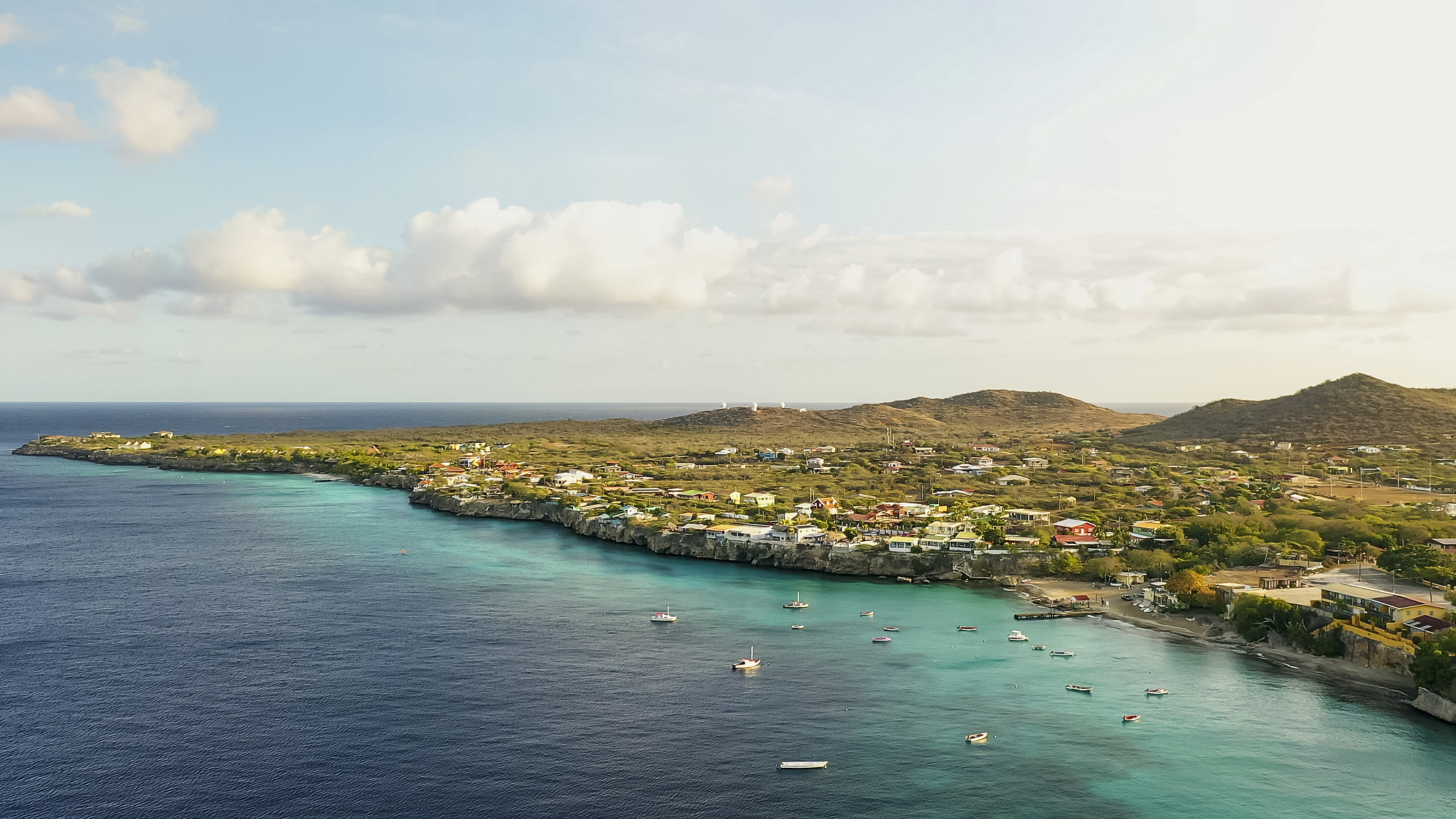 aerial view of coast of curacao in the caribbean sea with turquo