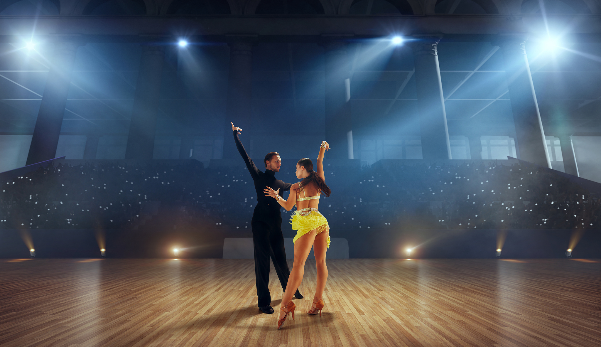 correct As depicted in the picture there are several vivacious ladies dancing intently on the stage And there are many inquisitive audiance are watching them