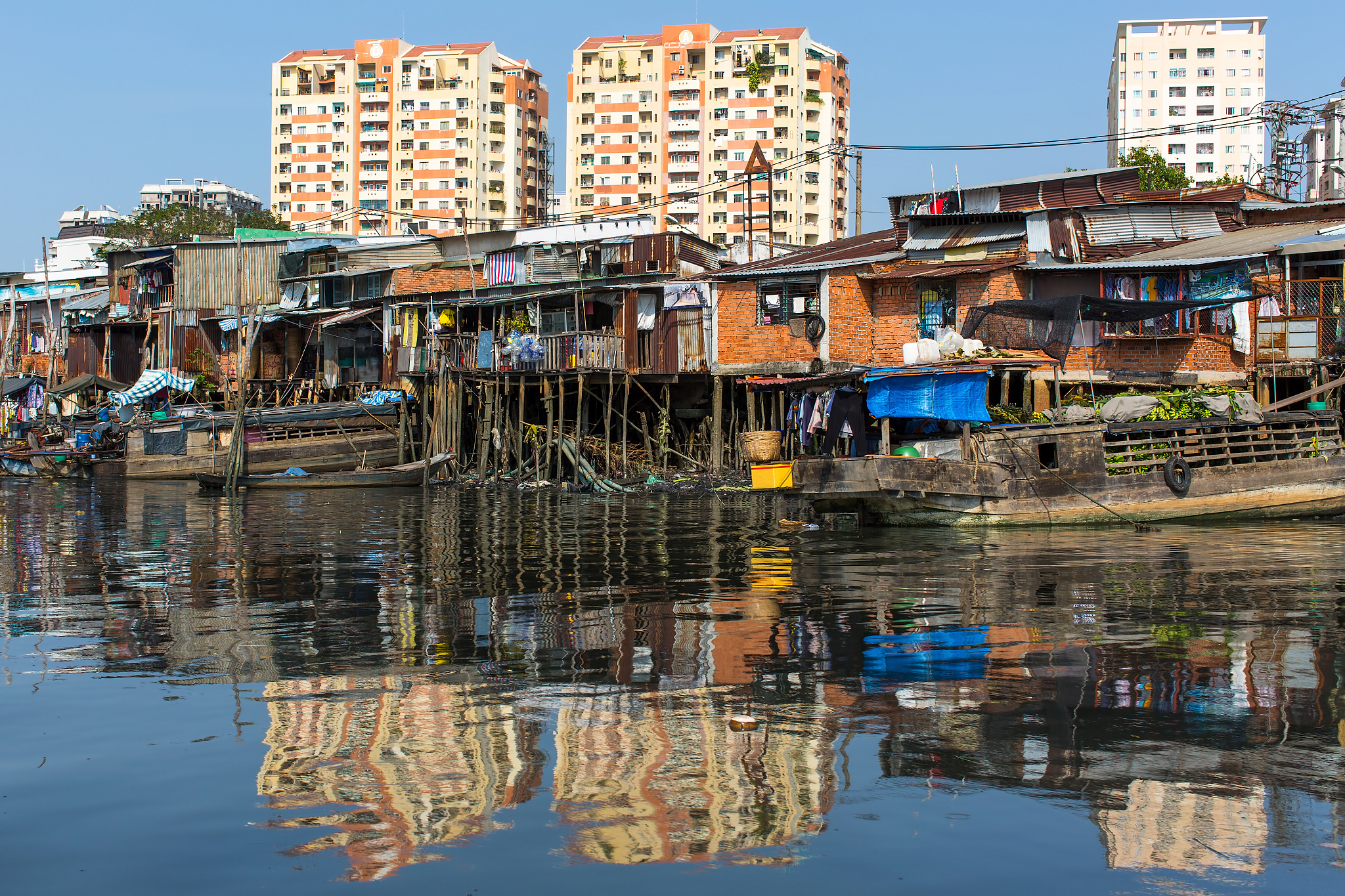 views of the city's slums from the river.