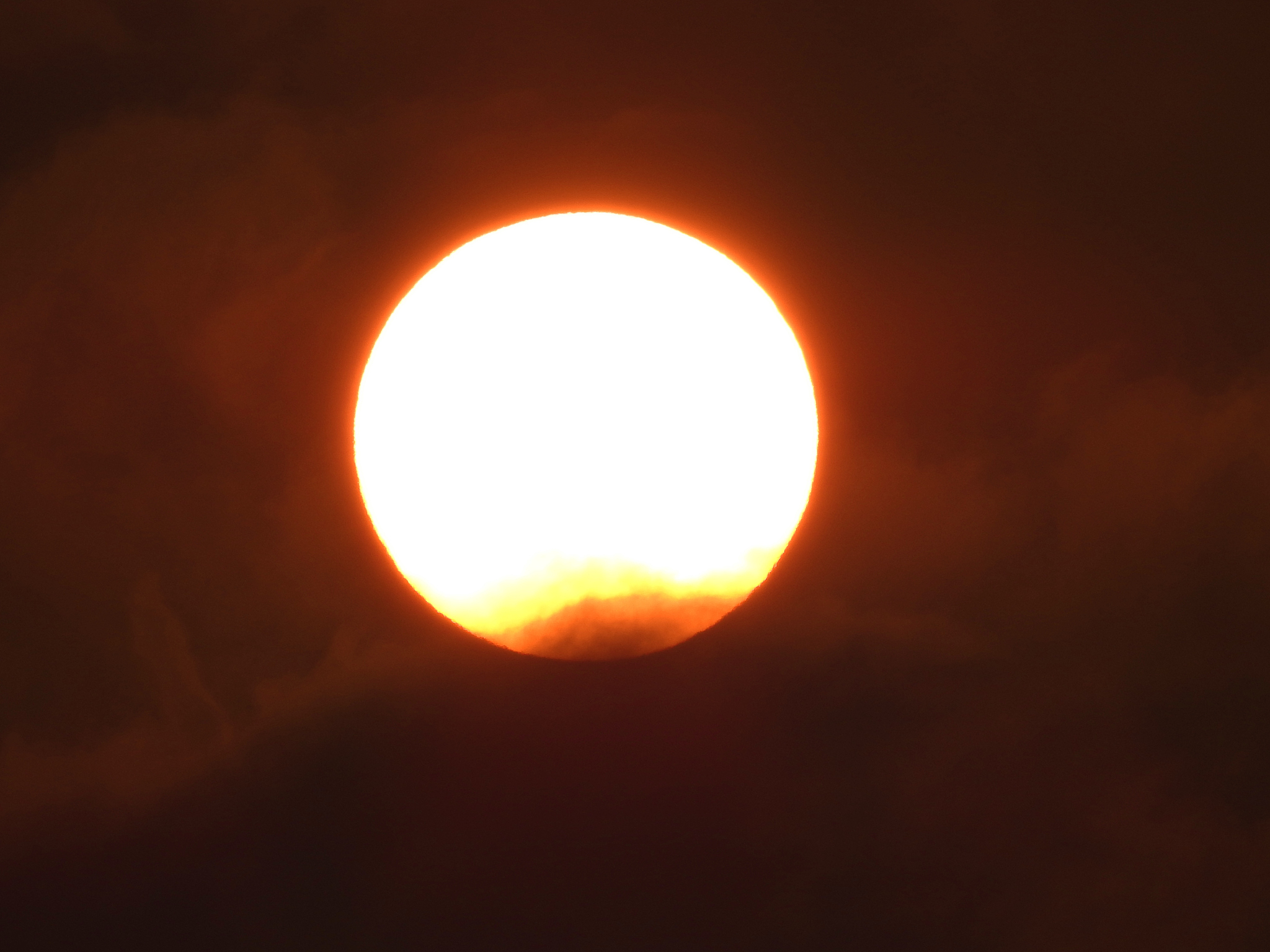 sun with clouds during sunset