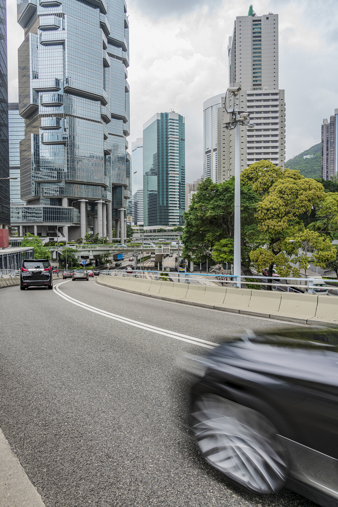 cars driving on hong kong street