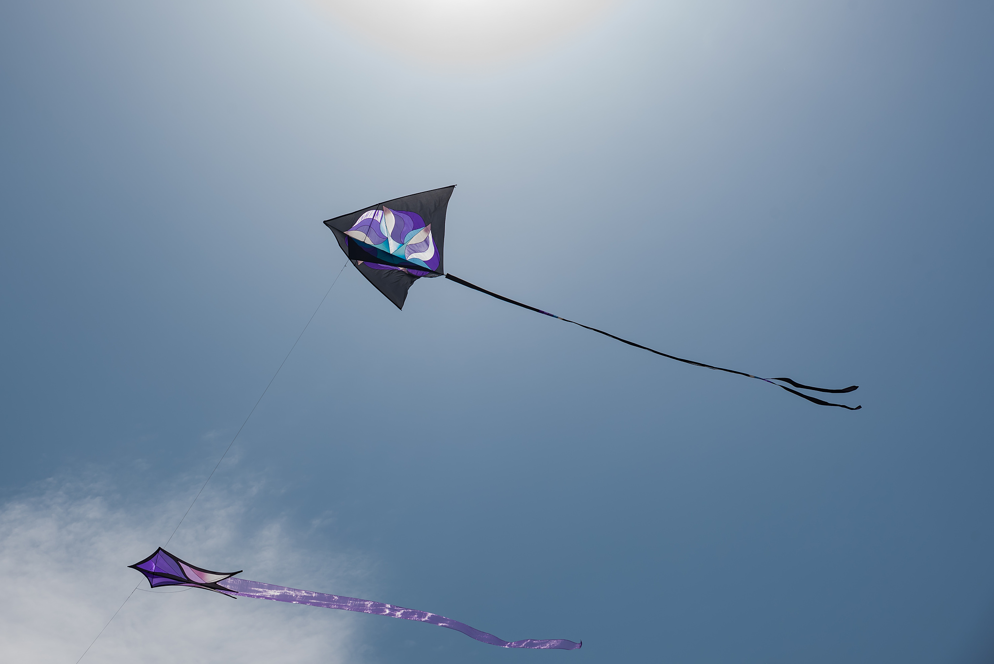 kites with blue sky and white clouds