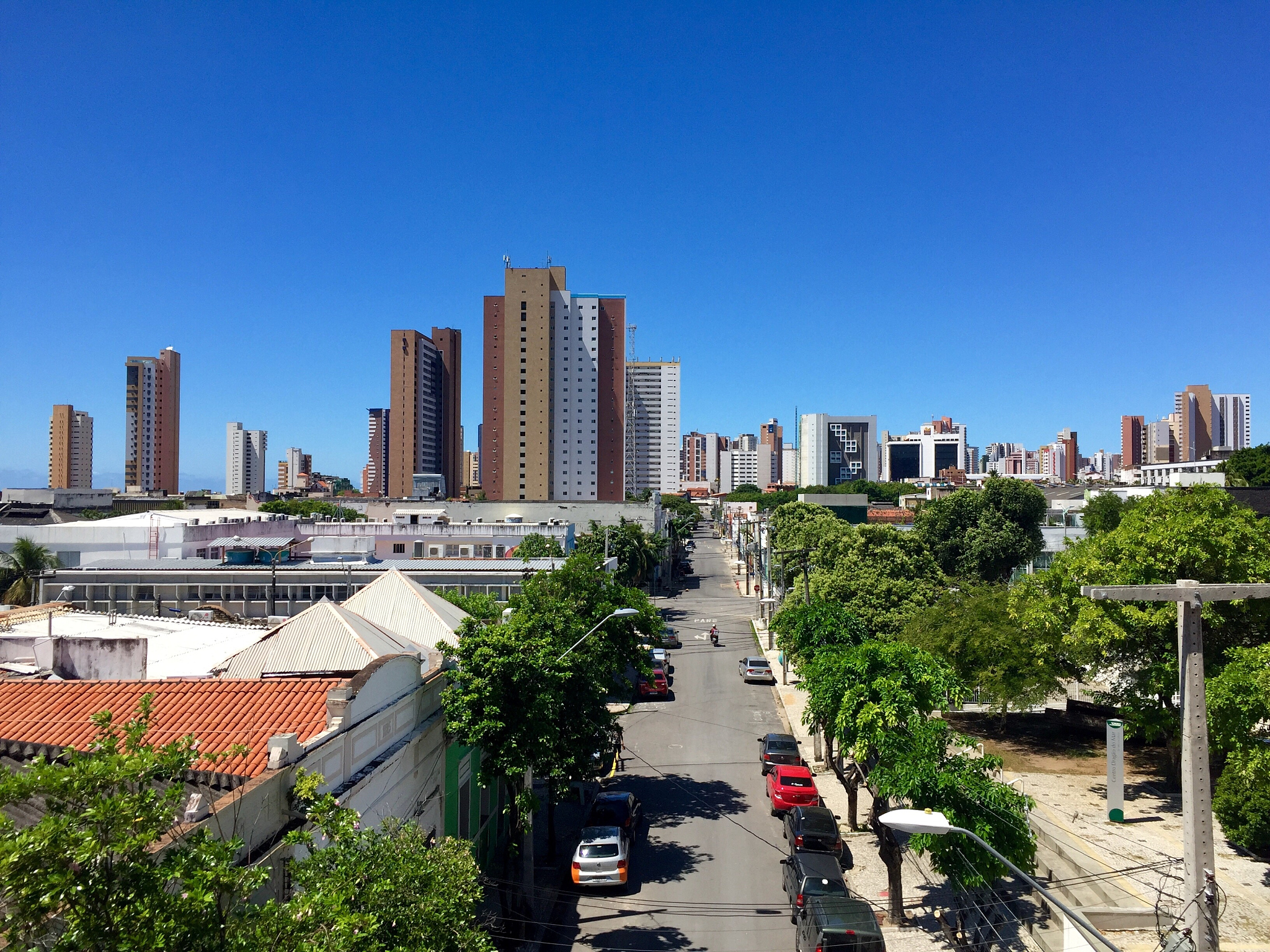 view of cityscape against clear blue sky