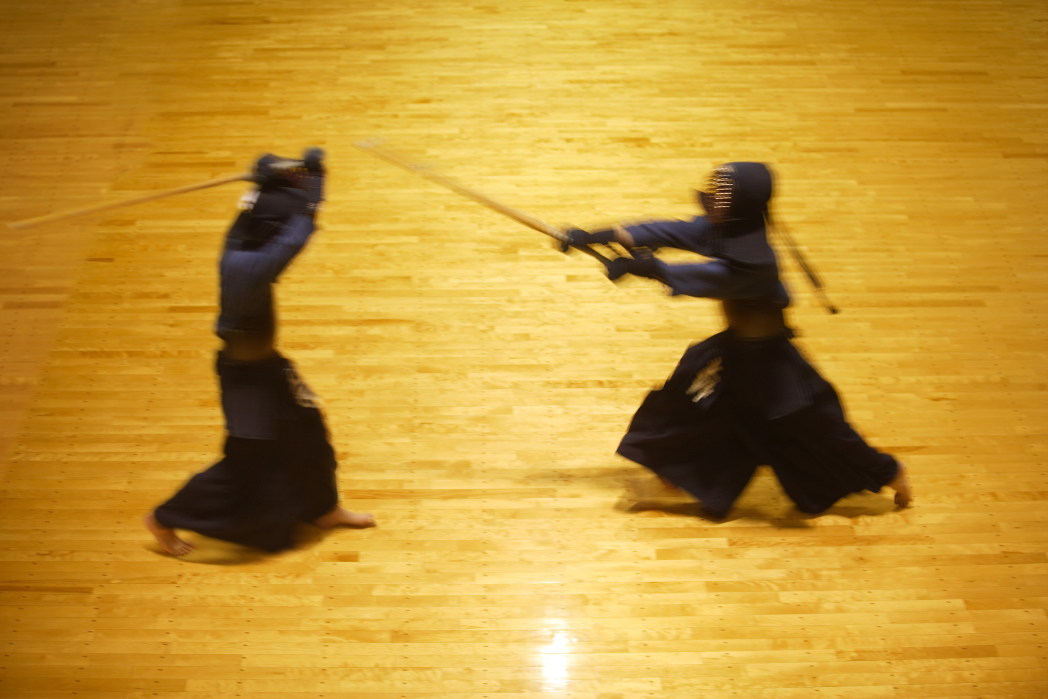 two kendo fencers sparring