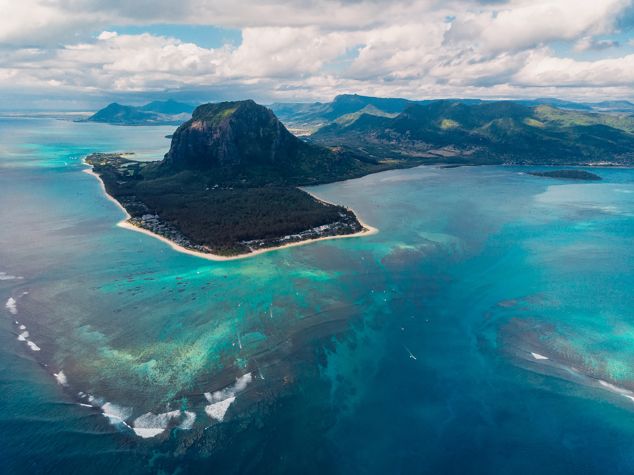 tropical island with le morne mountain, ocean and beach in mauri