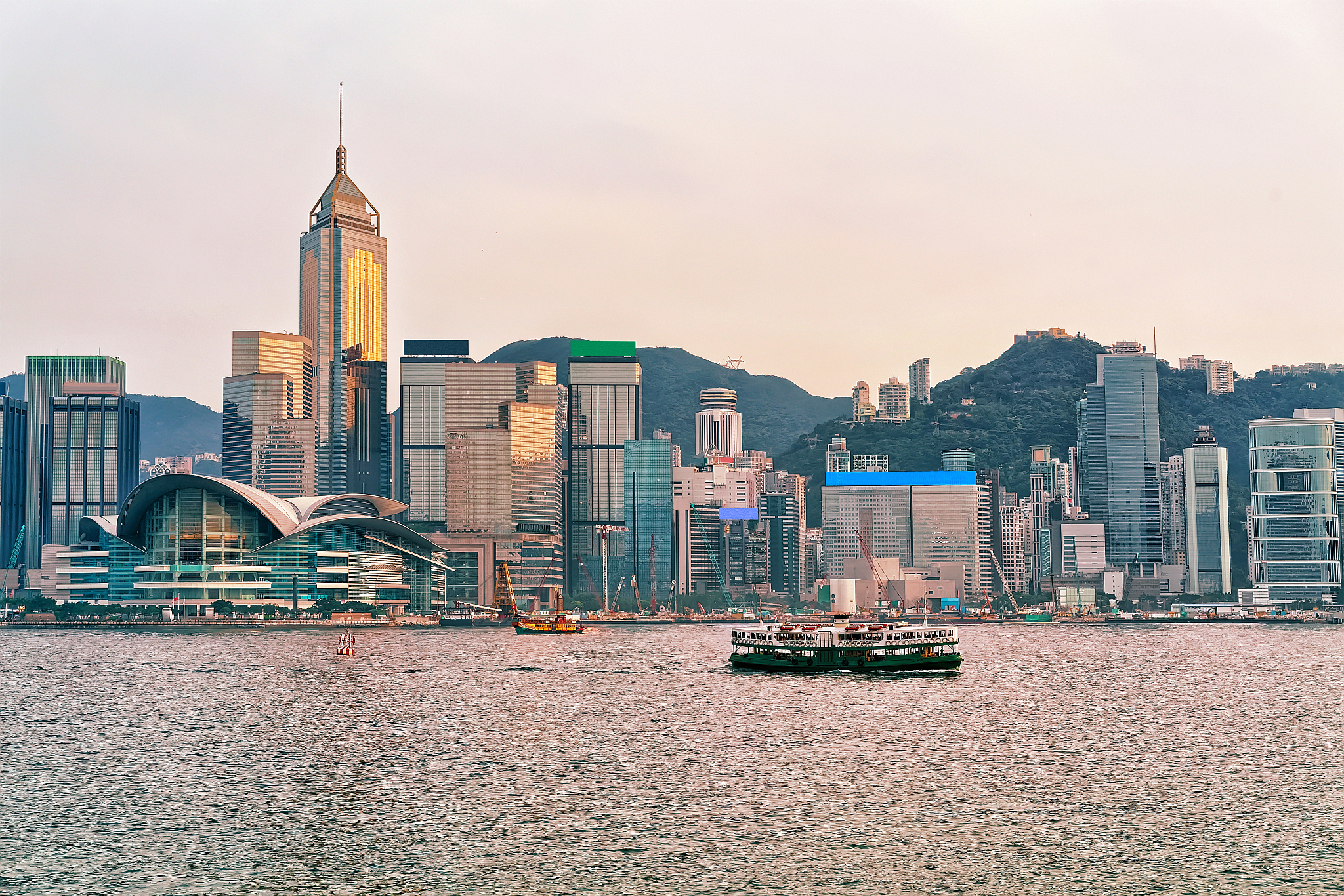 star ferry in victoria harbor in hk at sundown