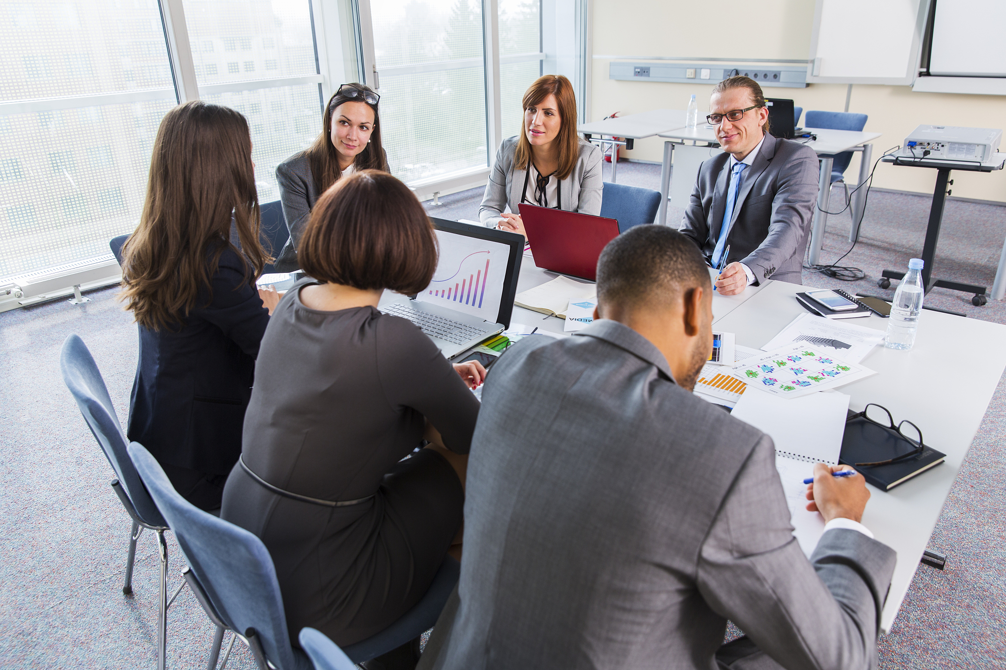 business people in education room talking about their problems