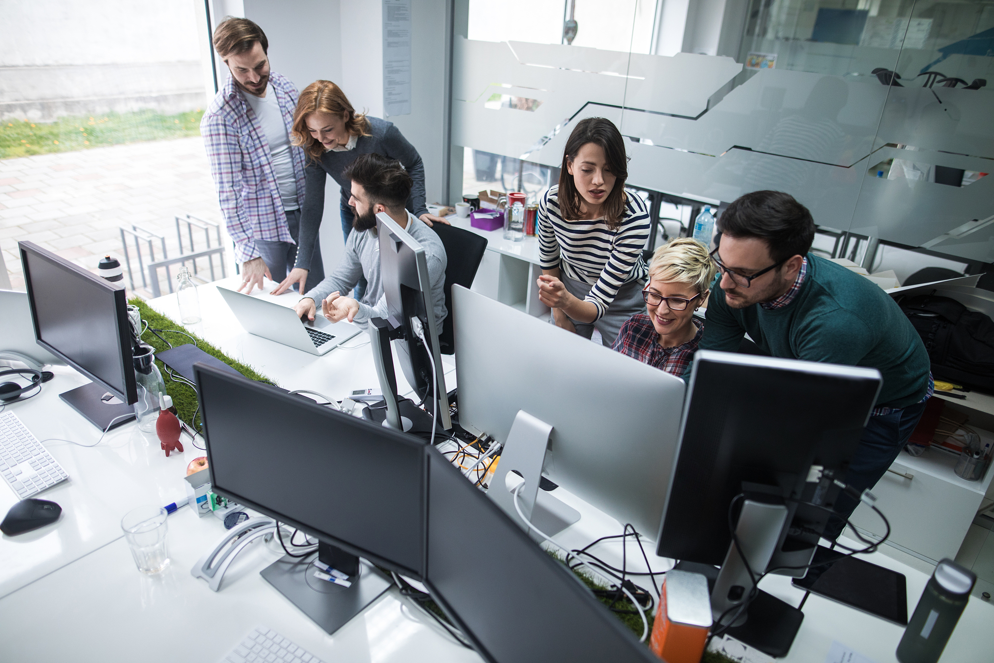 web designers working in office on project together