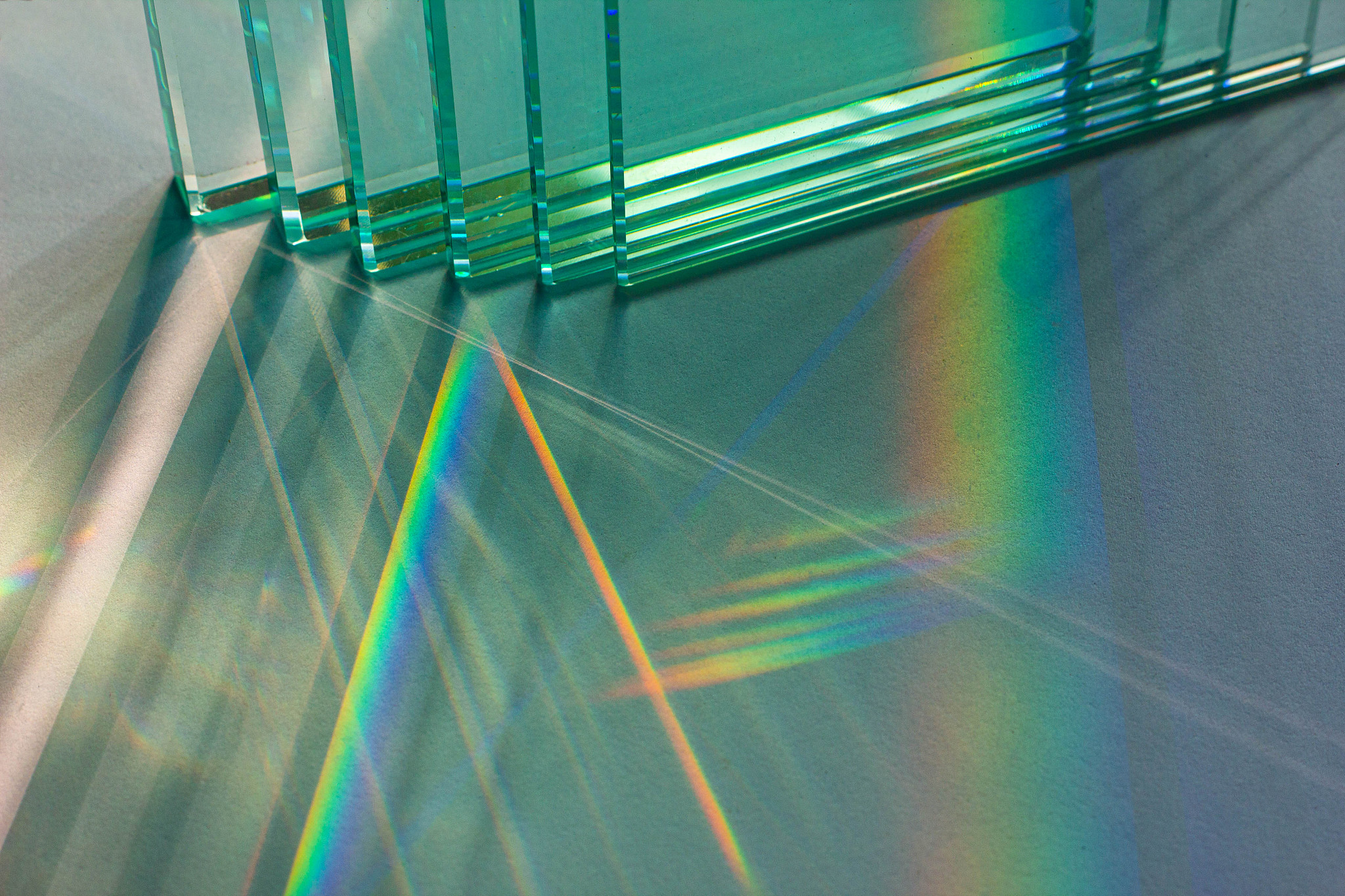 激光通过旋转的毛玻璃产生的非相干光和通过静止的毛玻璃产生的非相干光有什么区别