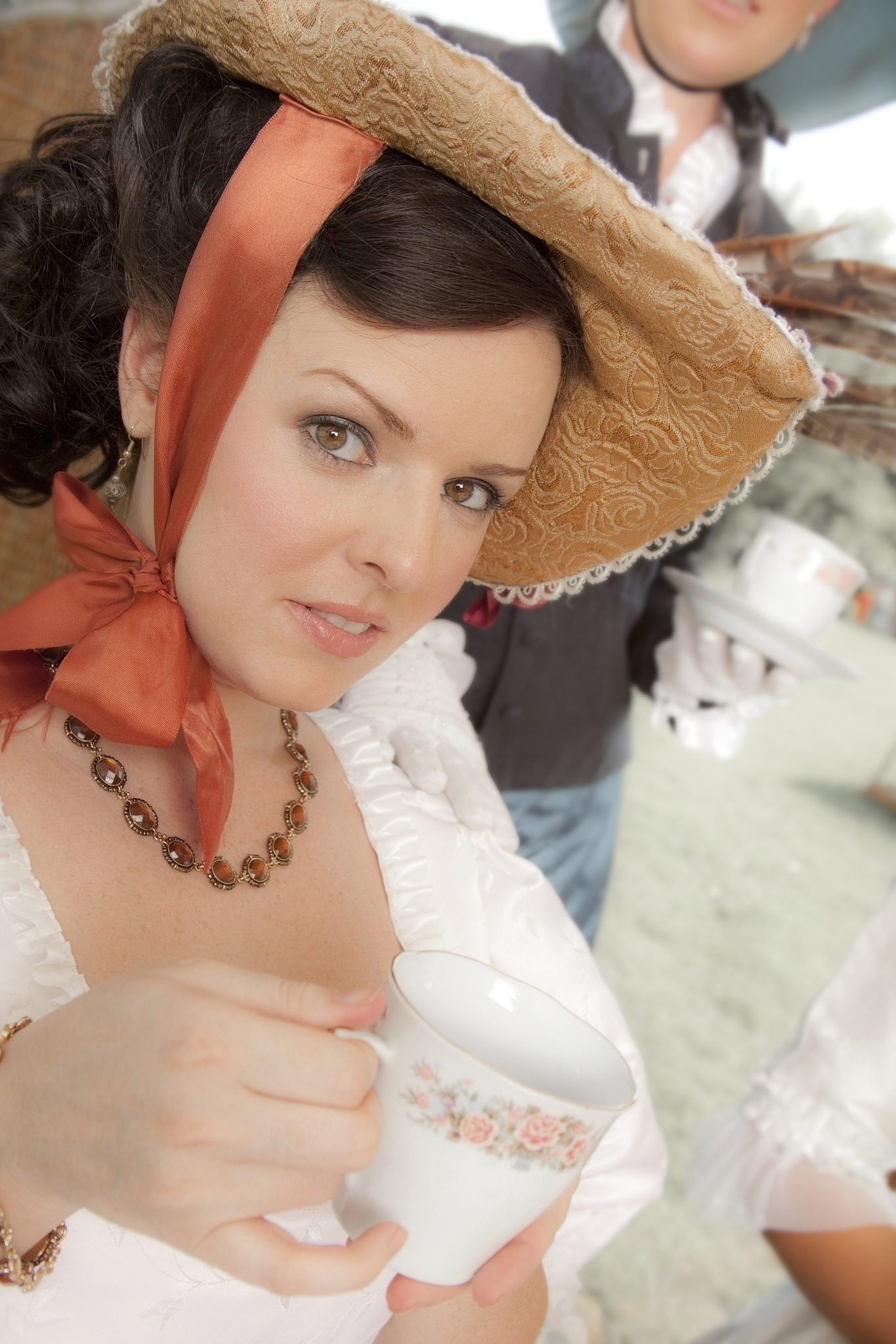 fashion: victorian style women have afternoon tea.