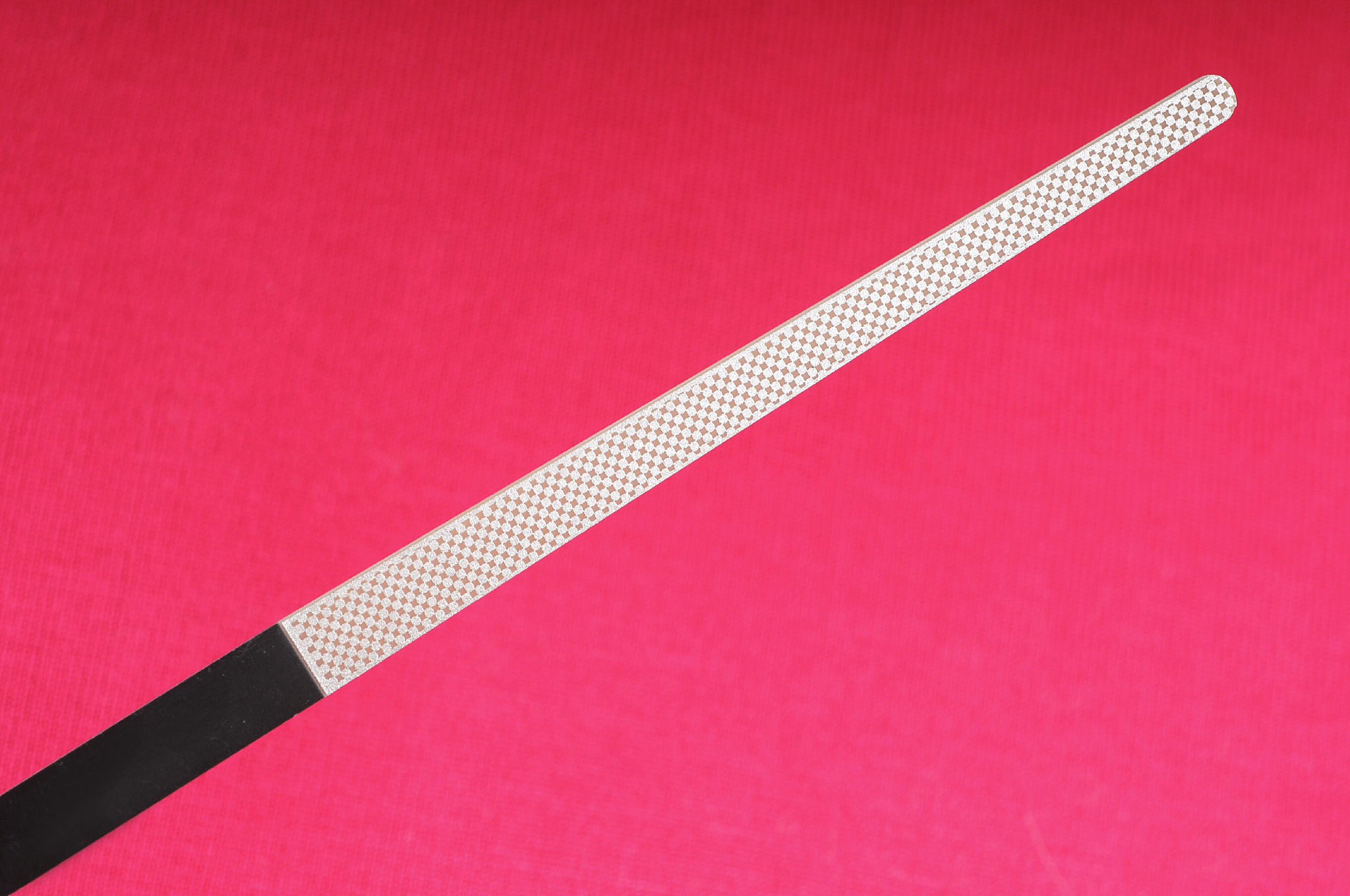 diamond cuticle nail file manicure on bright pink background
