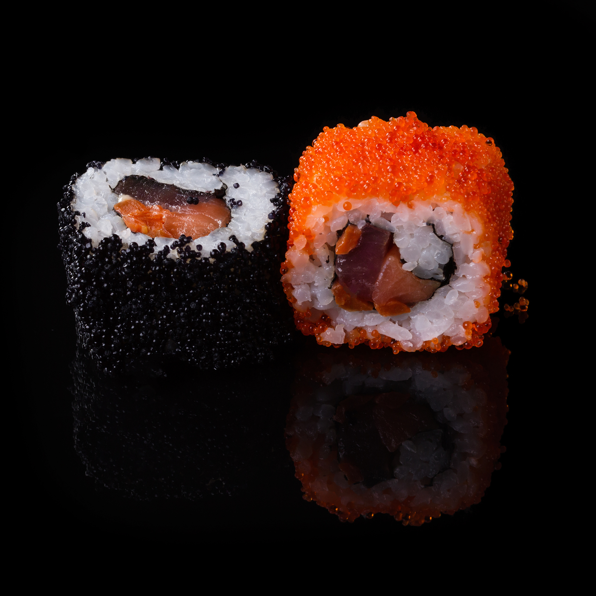 sushi on black background